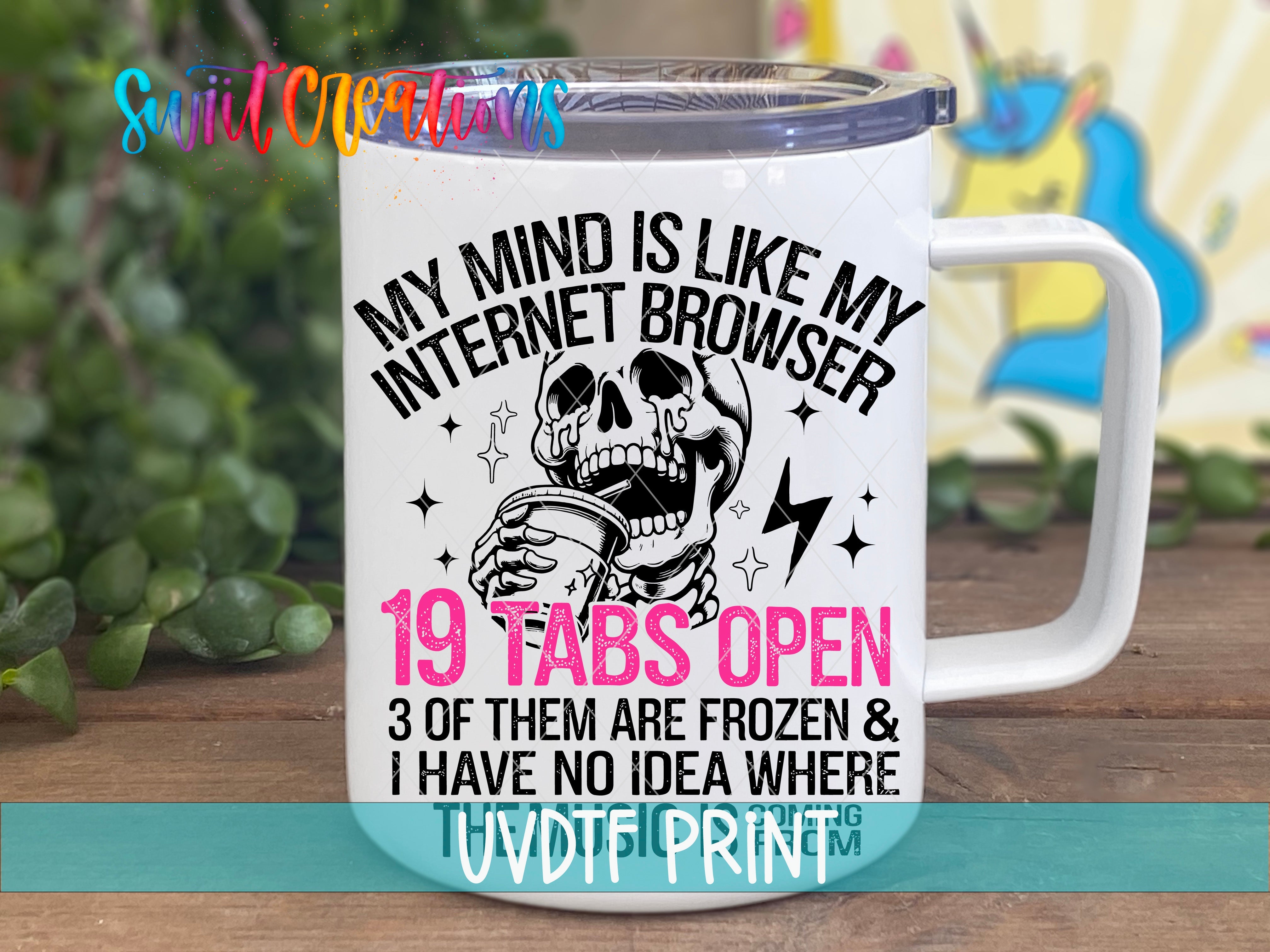 a white coffee mug with a skull on it