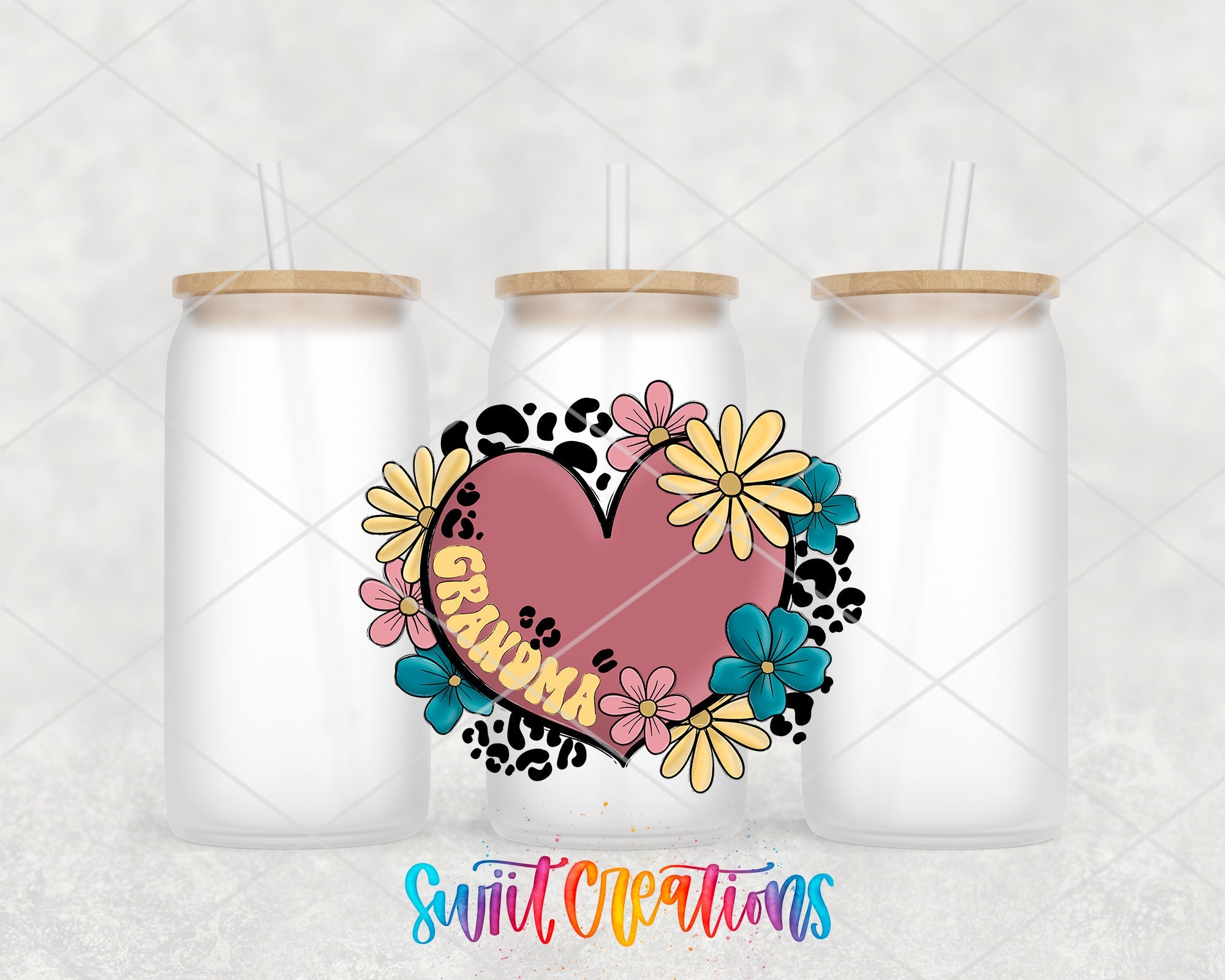 two white mason jars with a heart and flowers on them