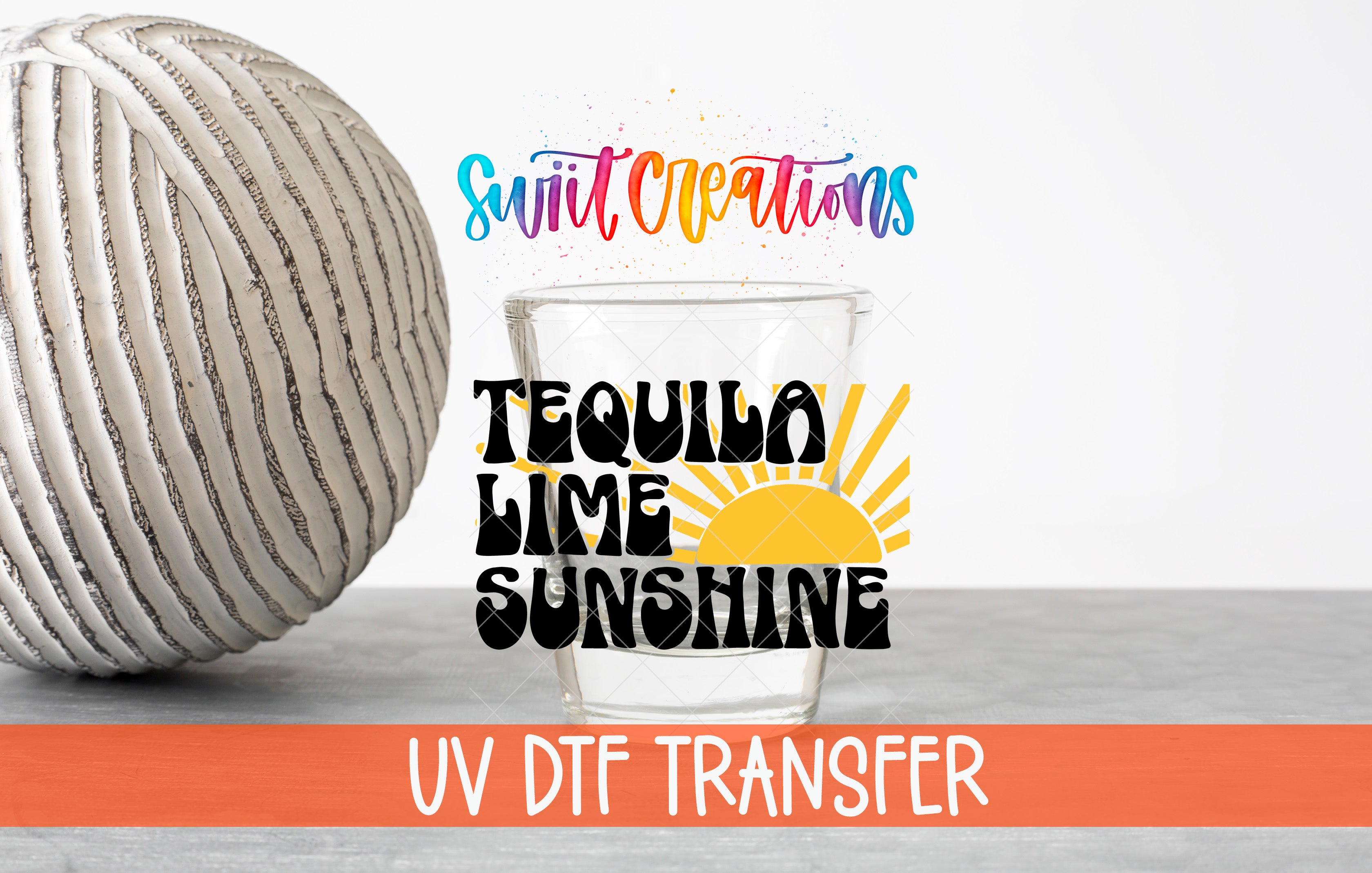 a glass with the words "TEQUILA LIME SUNSHINE" written on it, along with a decorative ball and a text overlay that says "Swit Creations UV Dtf Transfer".