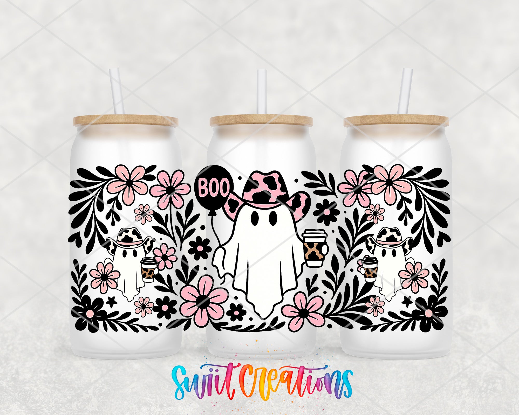 A trio of white tumblers with black and pink floral designs and ghostly figures, along with the text "Boo" and the word "Swit" in the center.
