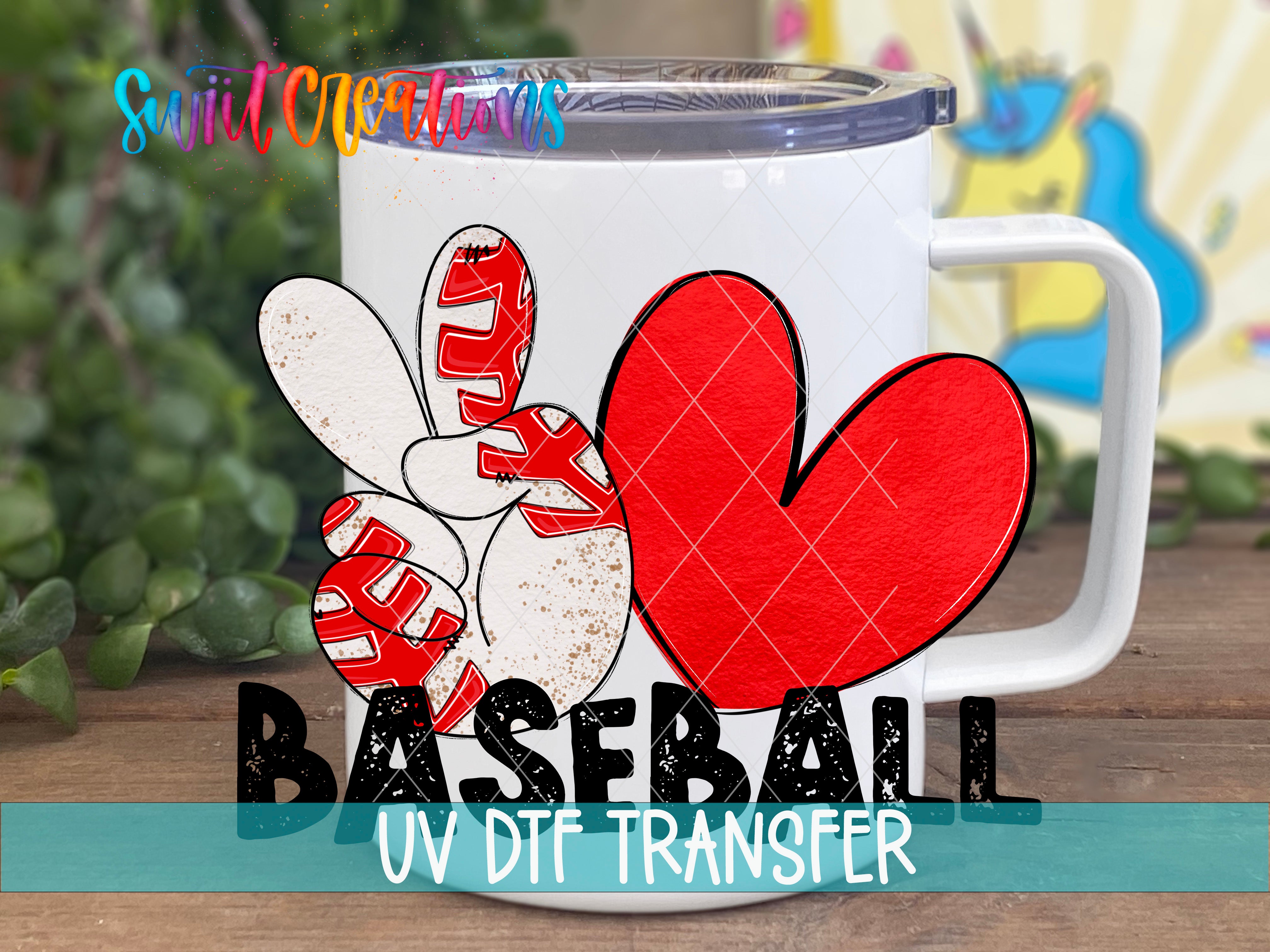 A white mug with a baseball design and the text "BASEBALL UV DDF TRANSFER" printed on it.