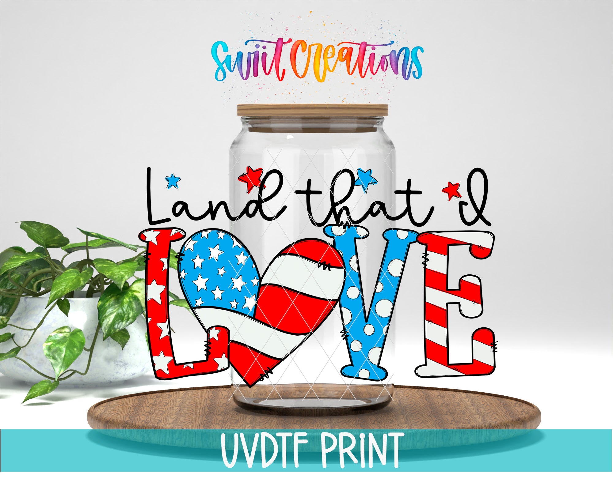 a clear glass jar with a wooden lid, decorated with patriotic symbols such as stars and stripes, and the text "Land that I LOVE" written on it.