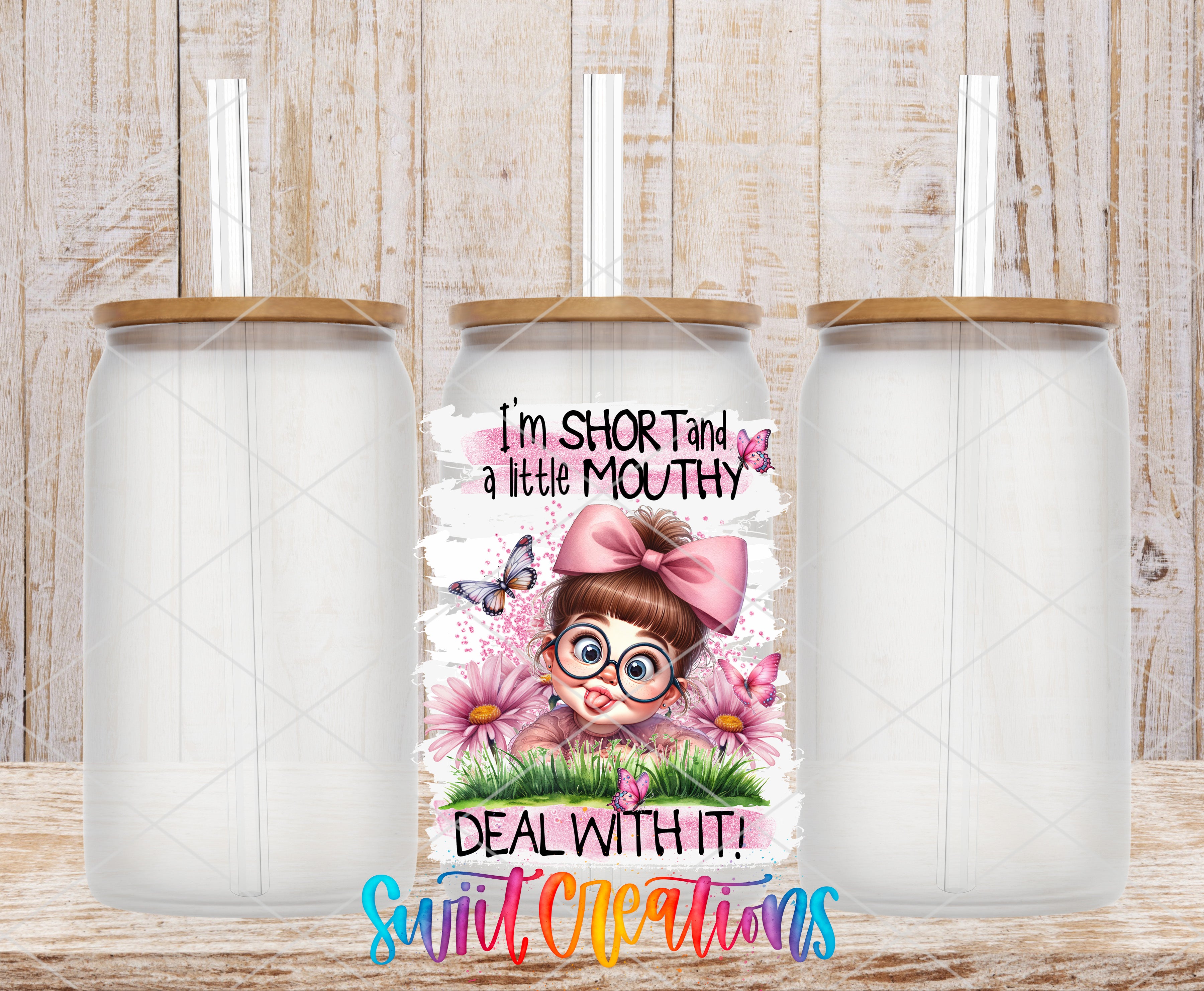 a collage of three empty glass jars with straws, each containing a different design. The central jar has a cartoon girl with a pink bow and glasses, surrounded by flowers and butterflies. The text on the central jar reads "I'm SHORT AND A LITTLE MOUTHY DEAL WITH IT!" and the text at the bottom of the image says "Suite Creations".