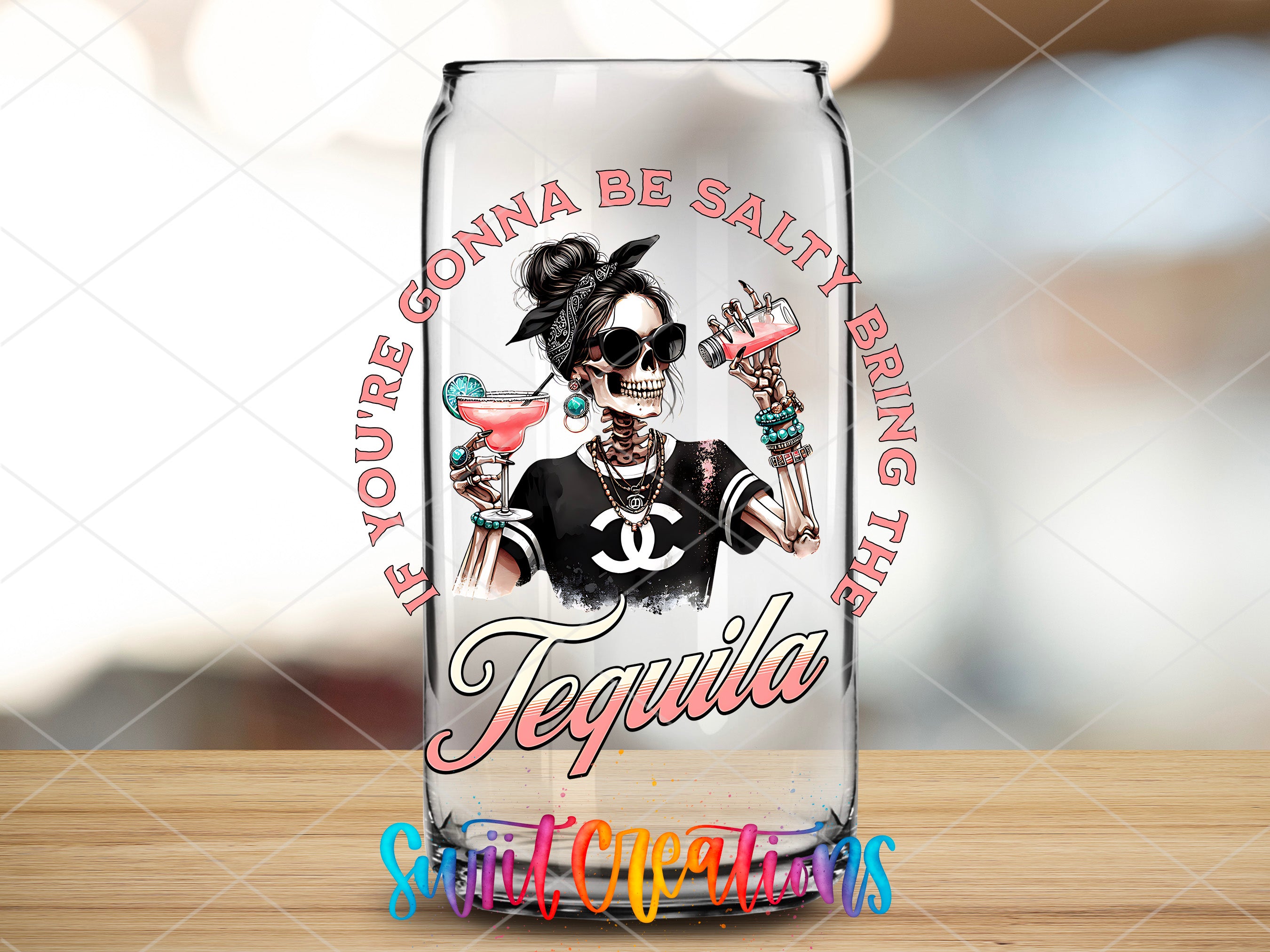 a glass with a picture of a woman on it