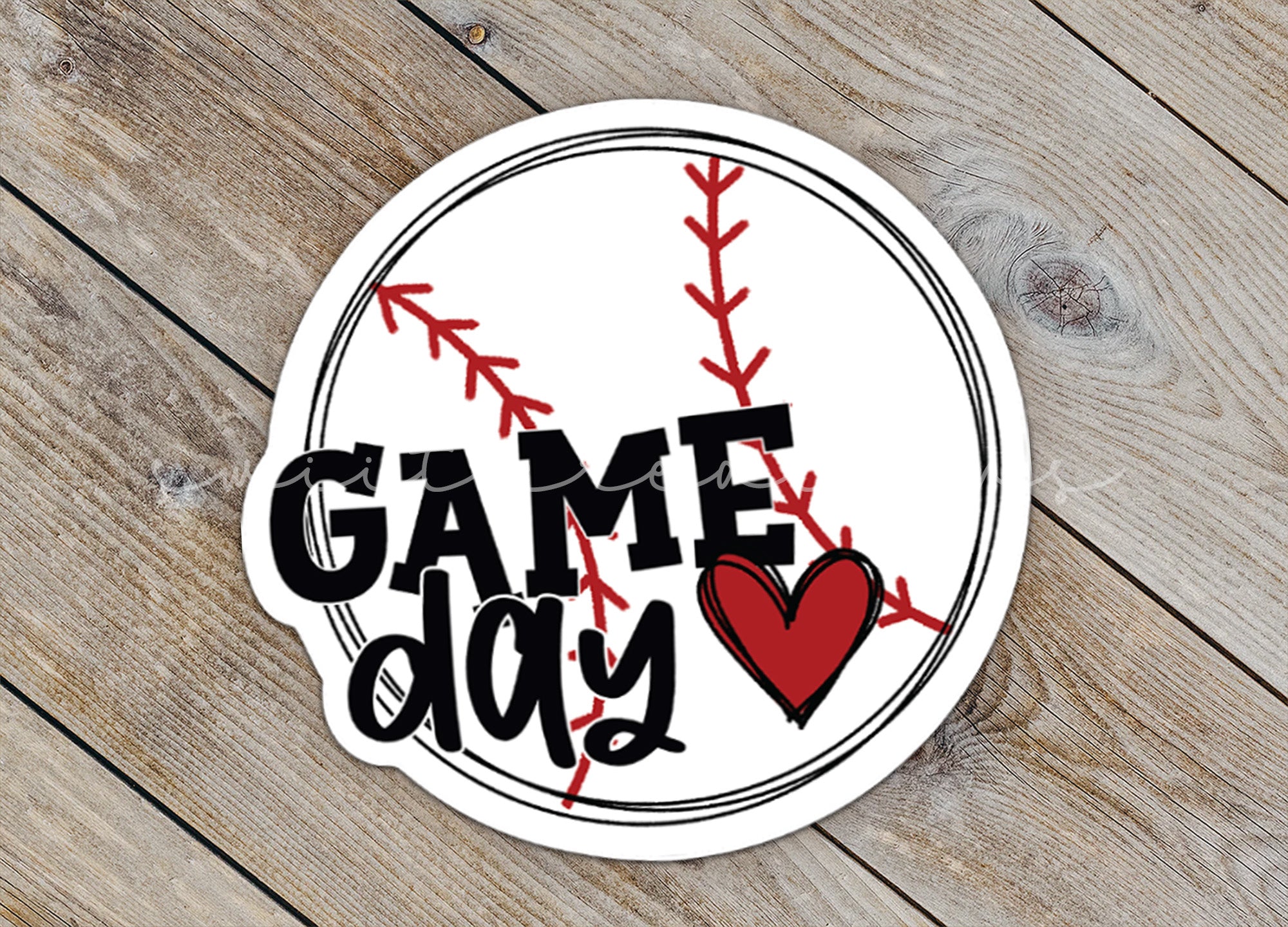 a sticker that says game day with a heart on it