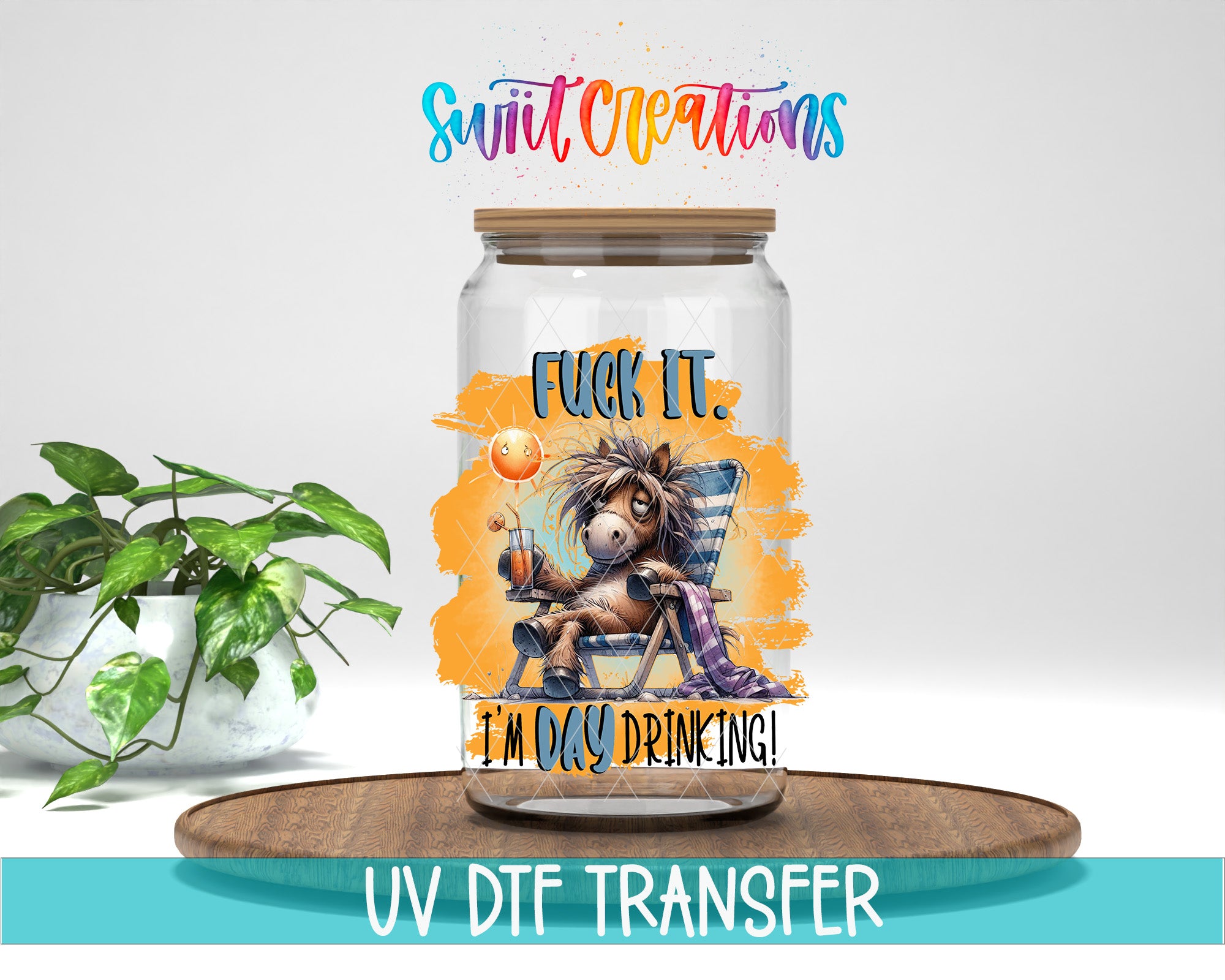 A glass jar with a cartoon horse and the text "FUCK IT I'M DAY DRINKING!" printed on it, along with the text "Swift Creations" and "UV Dtf Transfer" at the bottom.