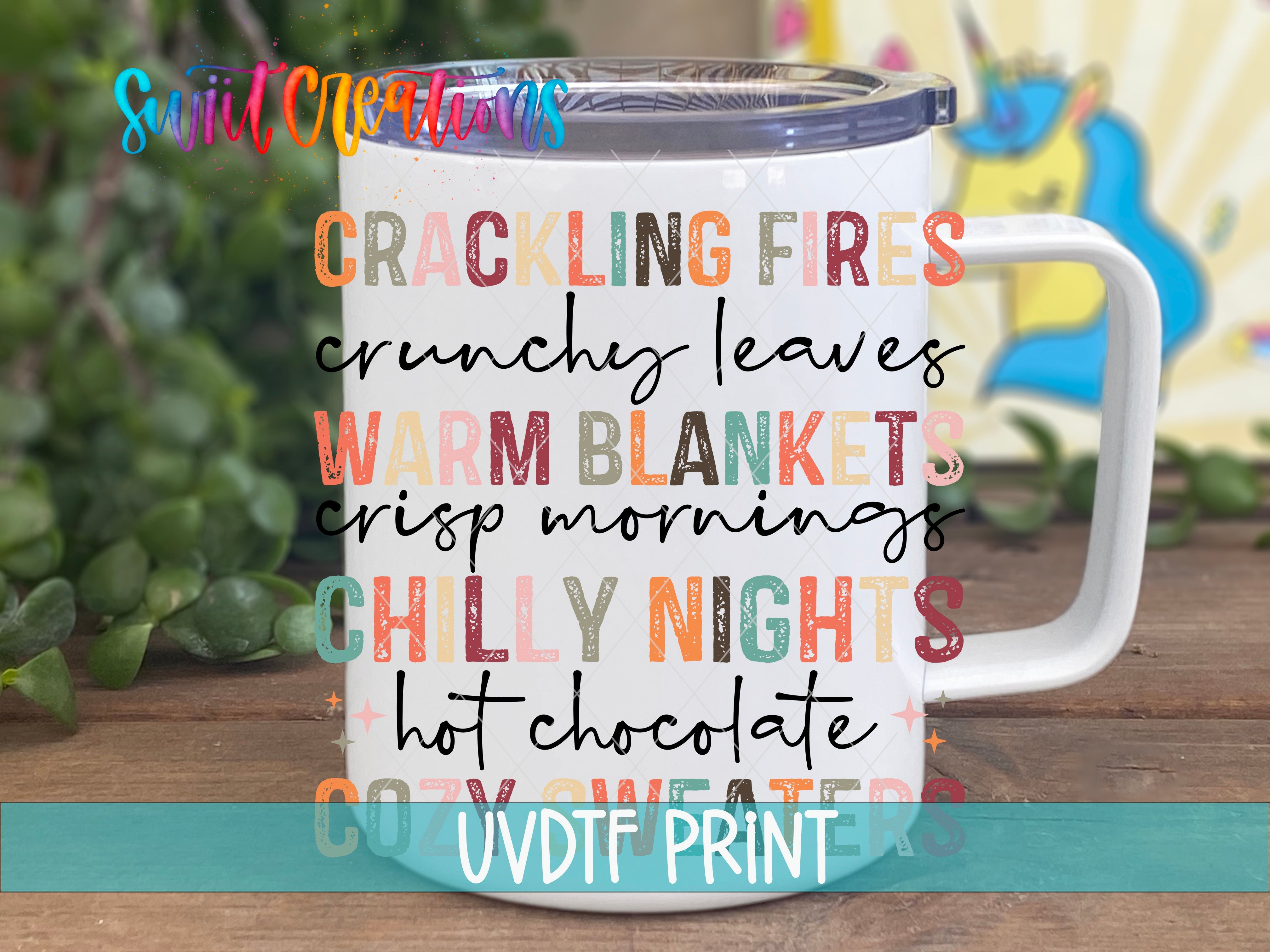 a white coffee mug with colorful words on it