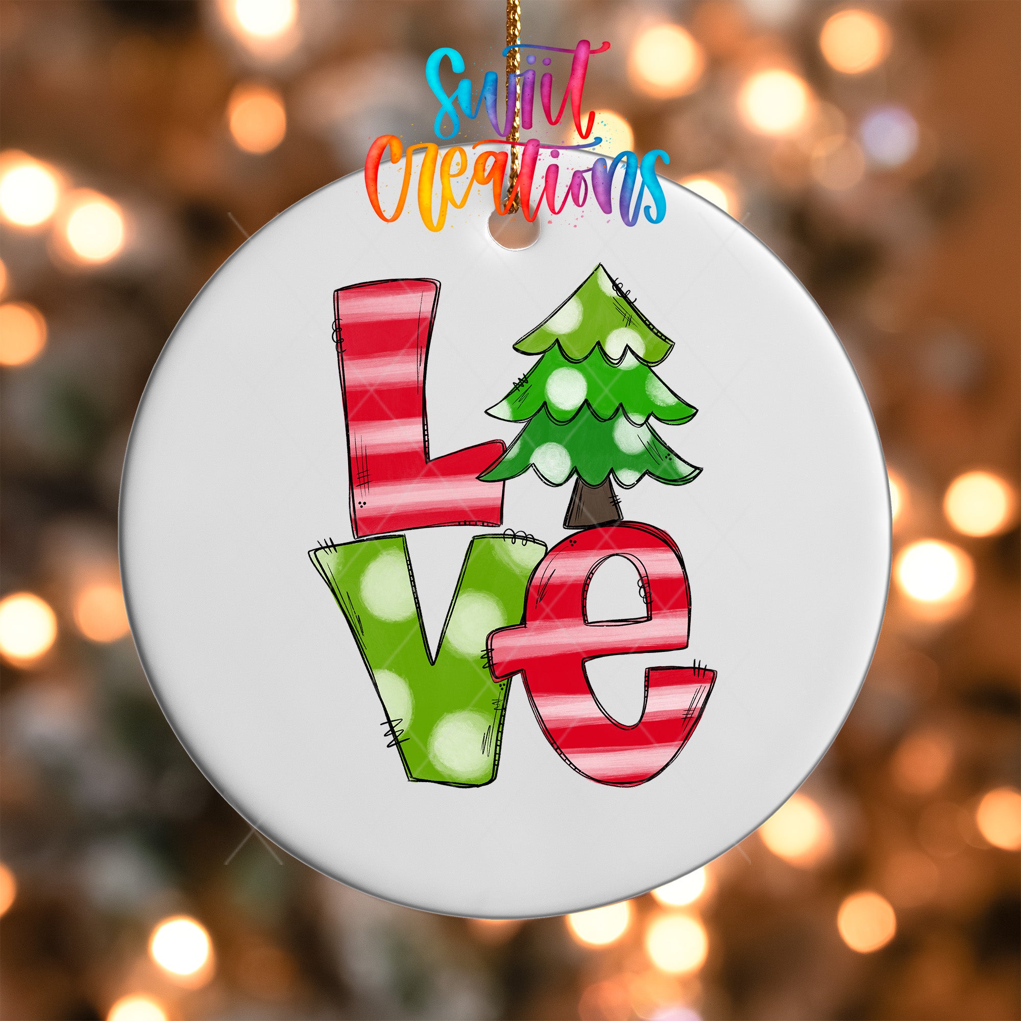 A white ornament with the word "LOVE" written in a colorful, hand-drawn style.