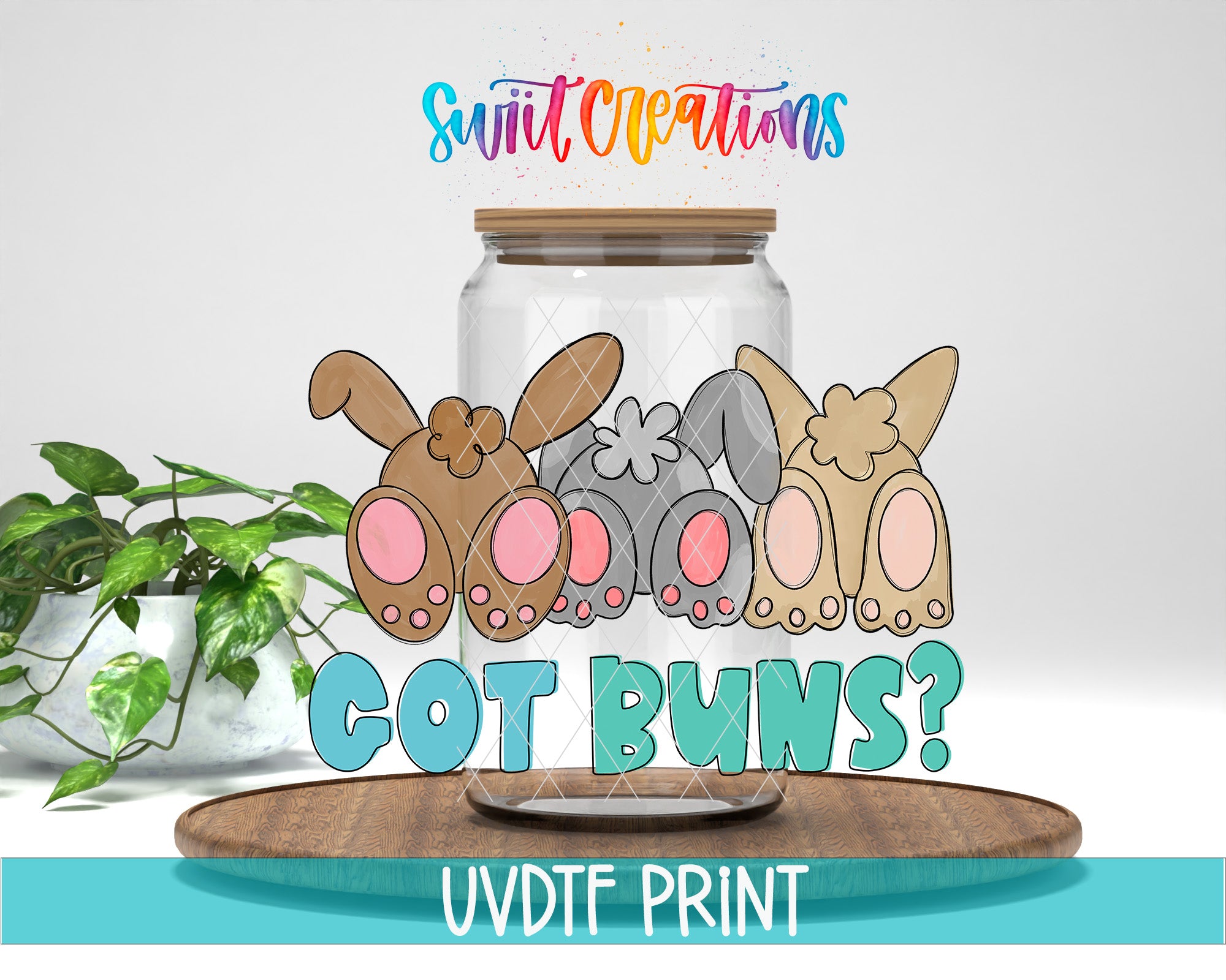 a glass jar with some bunny ears in it