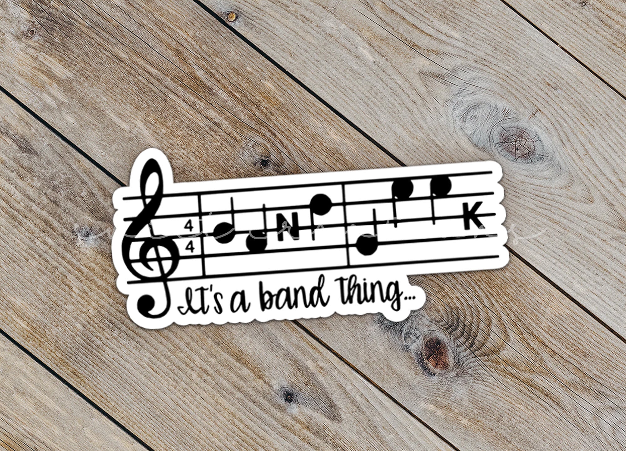 a sticker that says it's a band thing