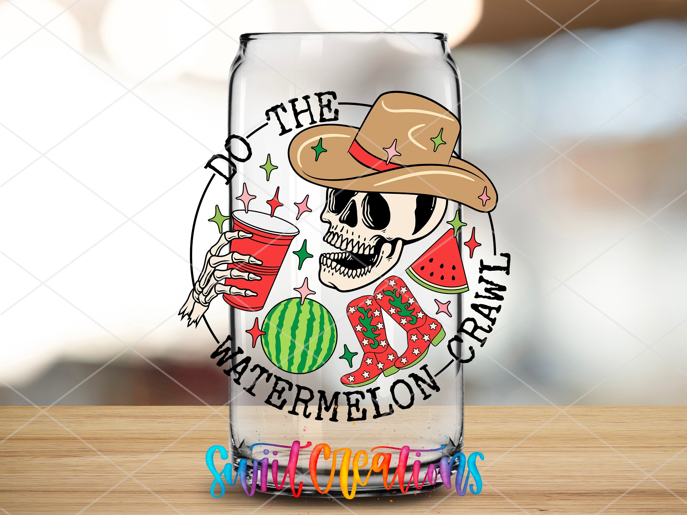 a glass with a skull wearing a cowboy hat