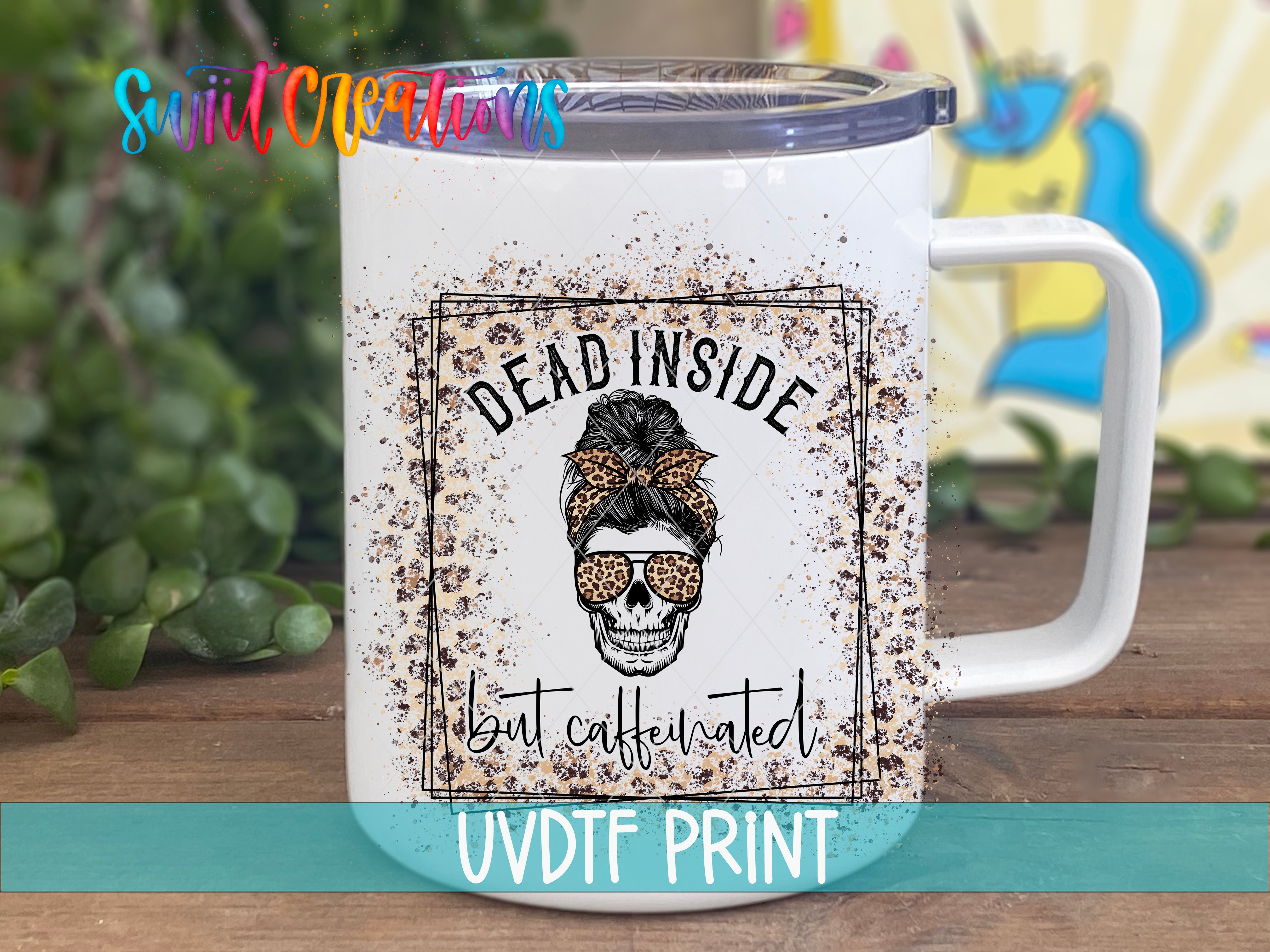 a white coffee mug with a picture of a skull on it
