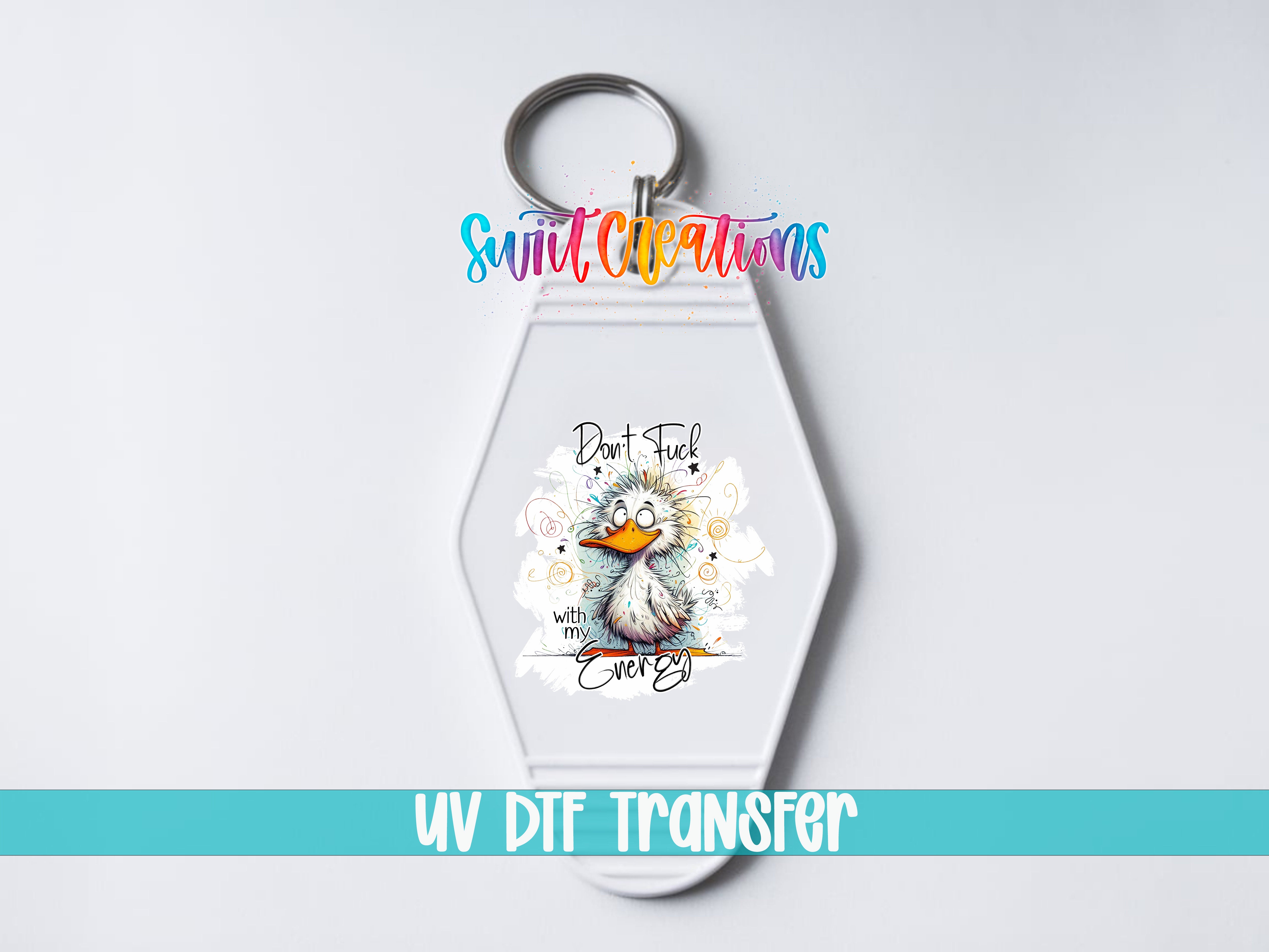 A keychain with a cartoon duck and the text "Don't Fuck It" printed on it.
