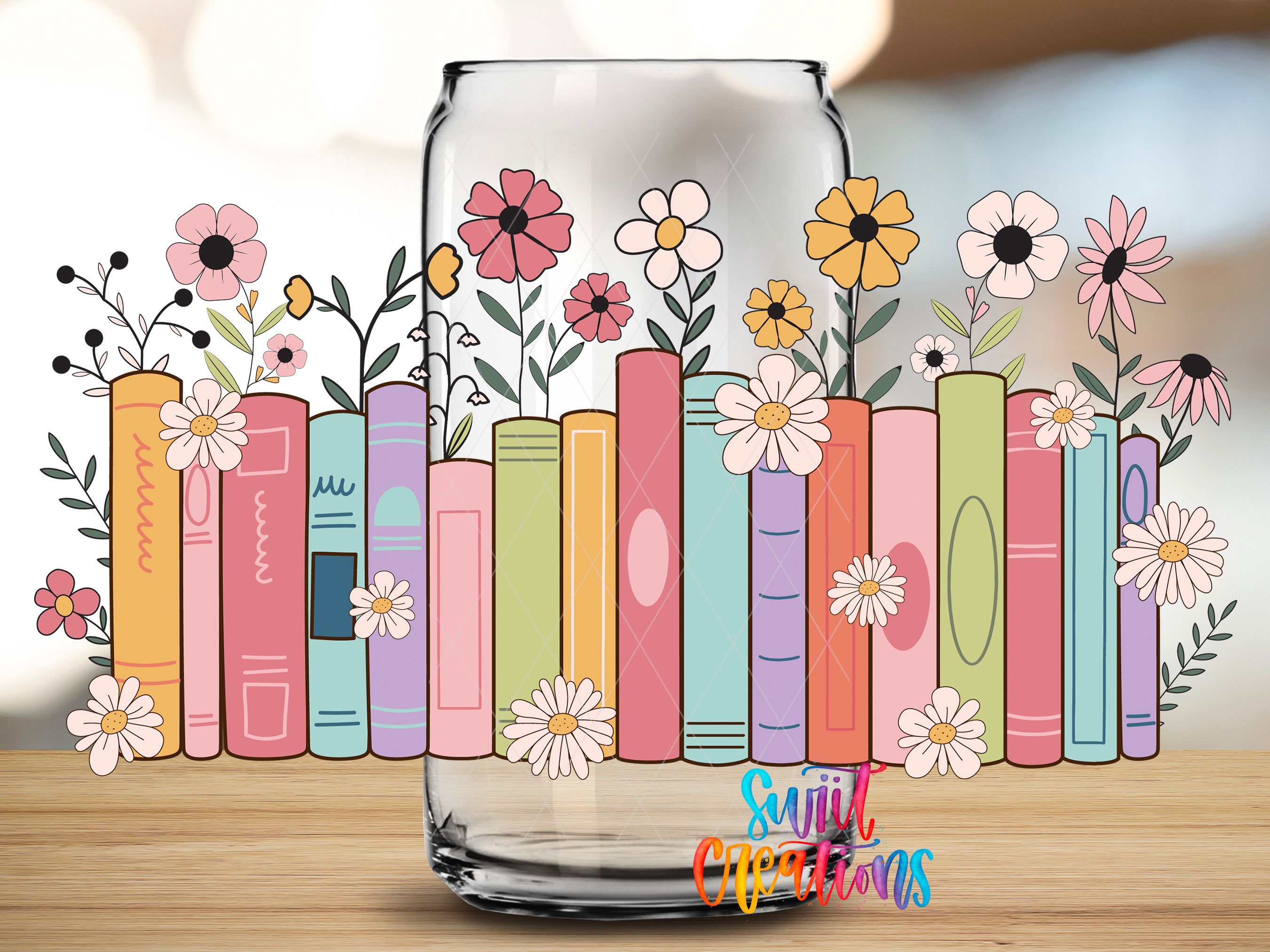 A glass vase filled with colorful flowers and plants, arranged in a row of books, creating a whimsical and artistic scene.