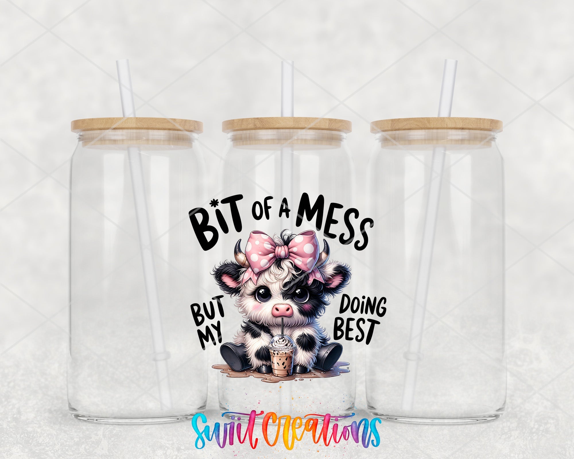 a couple of cups with a cow on them