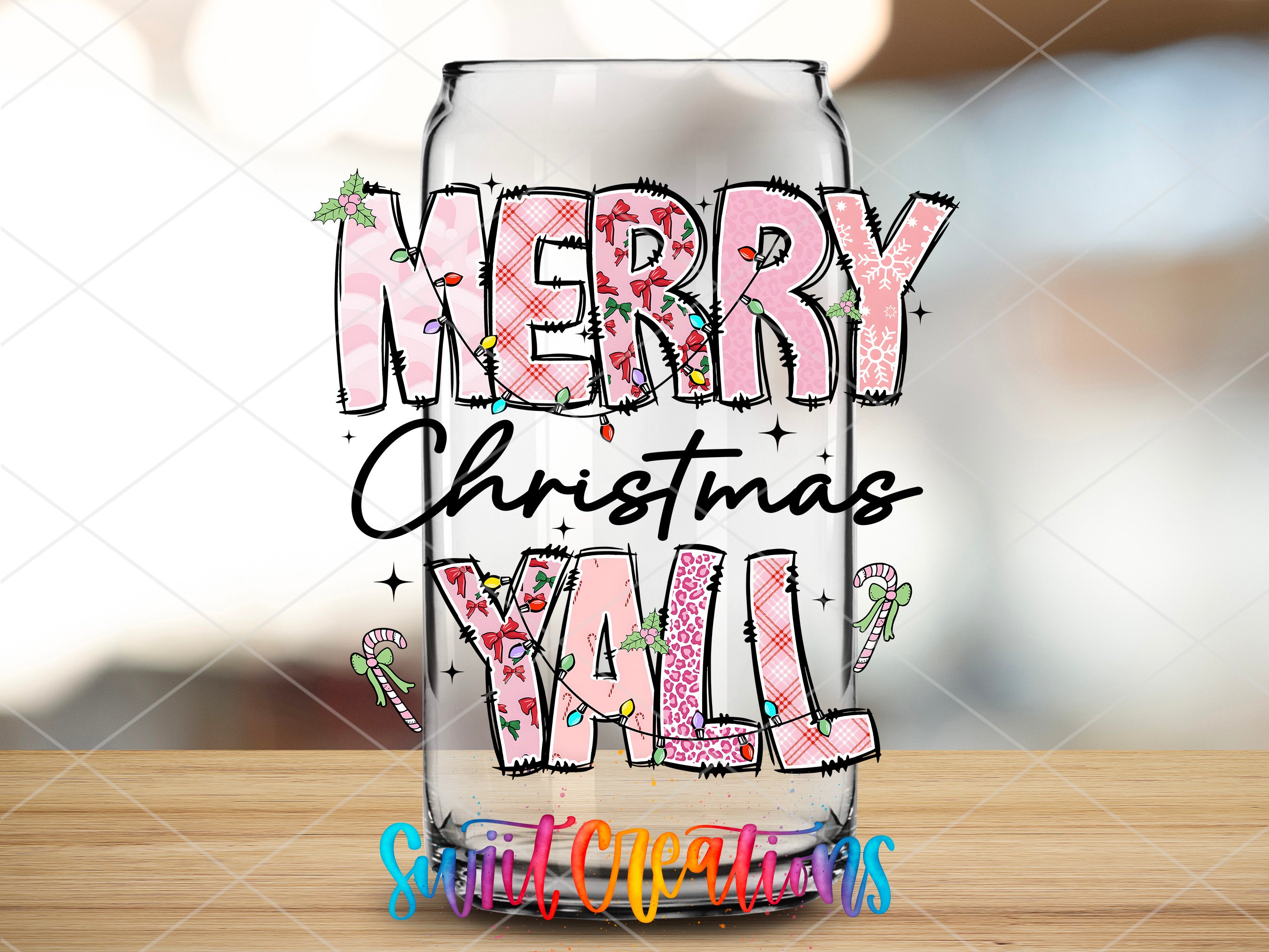 a glass with a merry christmas wall on it