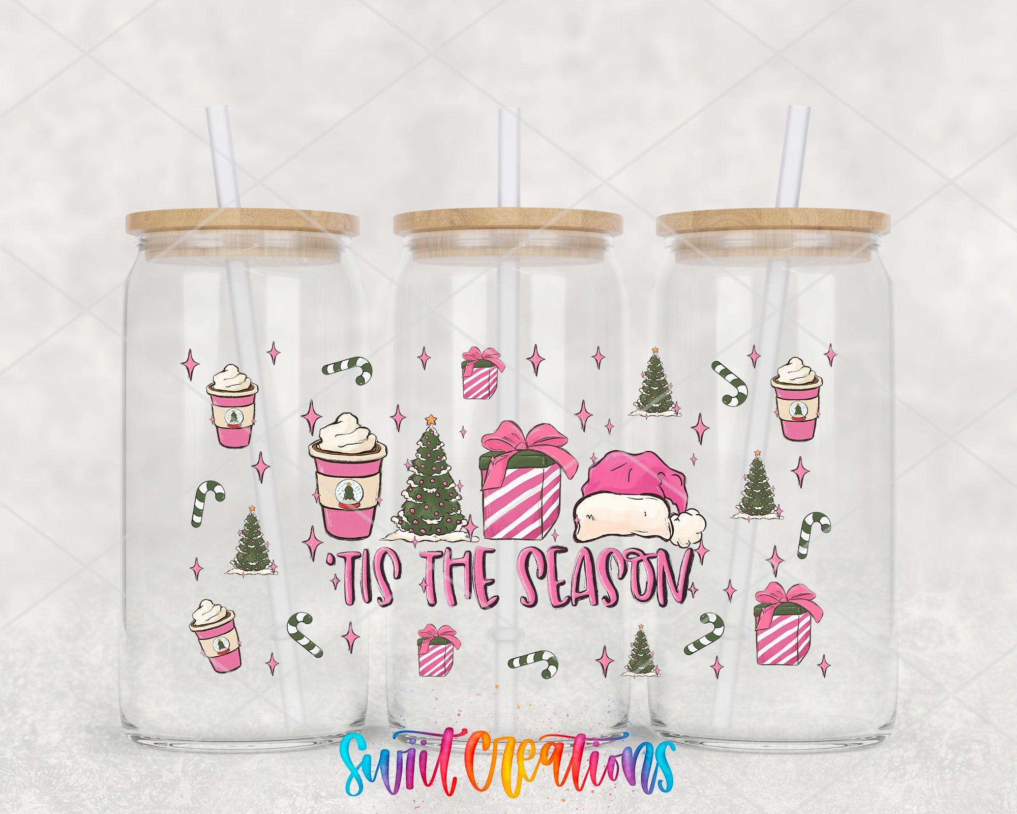 three tumblers with christmas themed designs on them