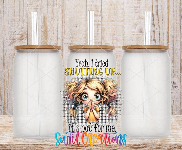 two coffee mugs with a picture of a girl on them