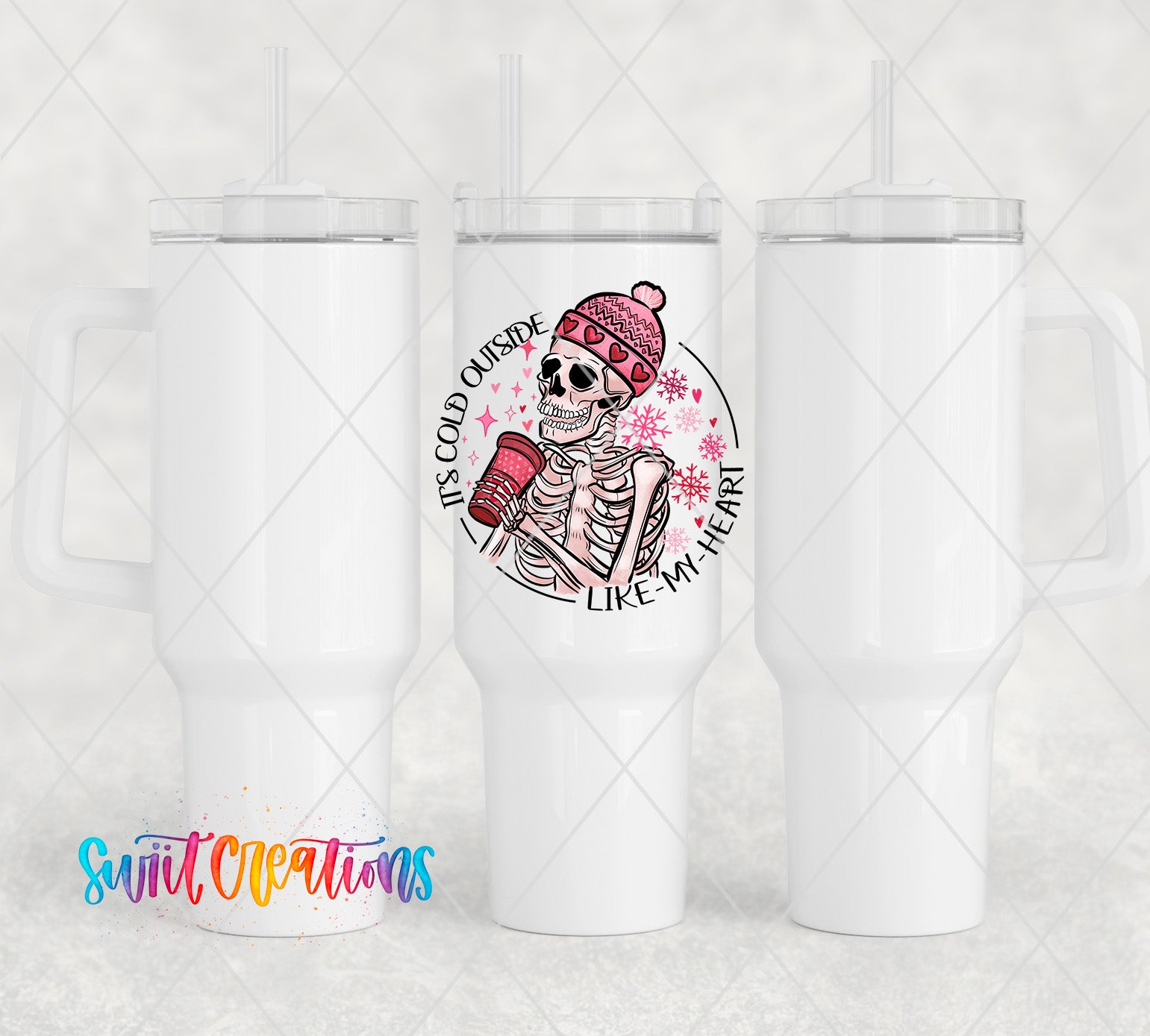 a couple of white coffee mugs sitting next to each other