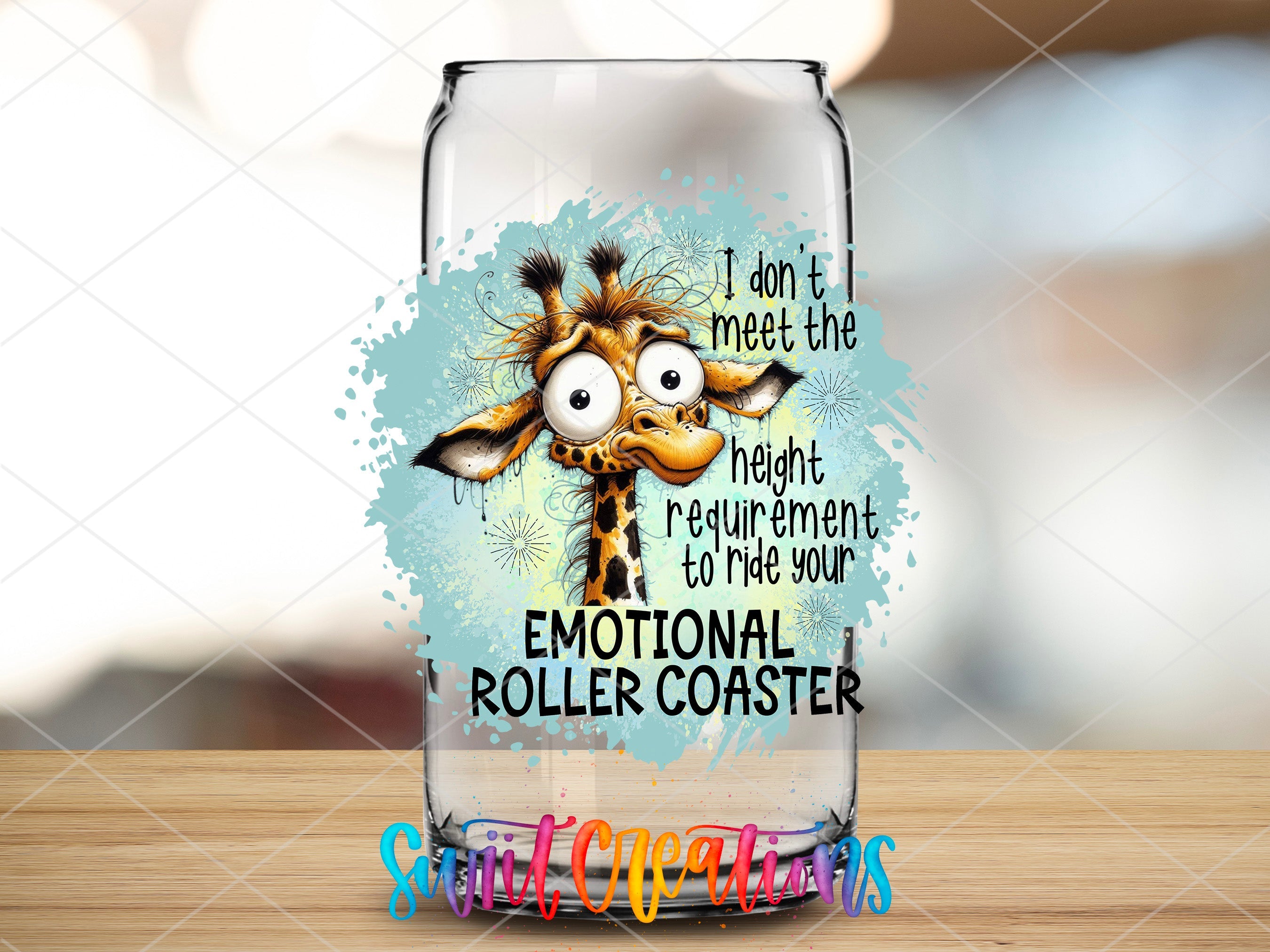 a glass with a picture of a giraffe on it