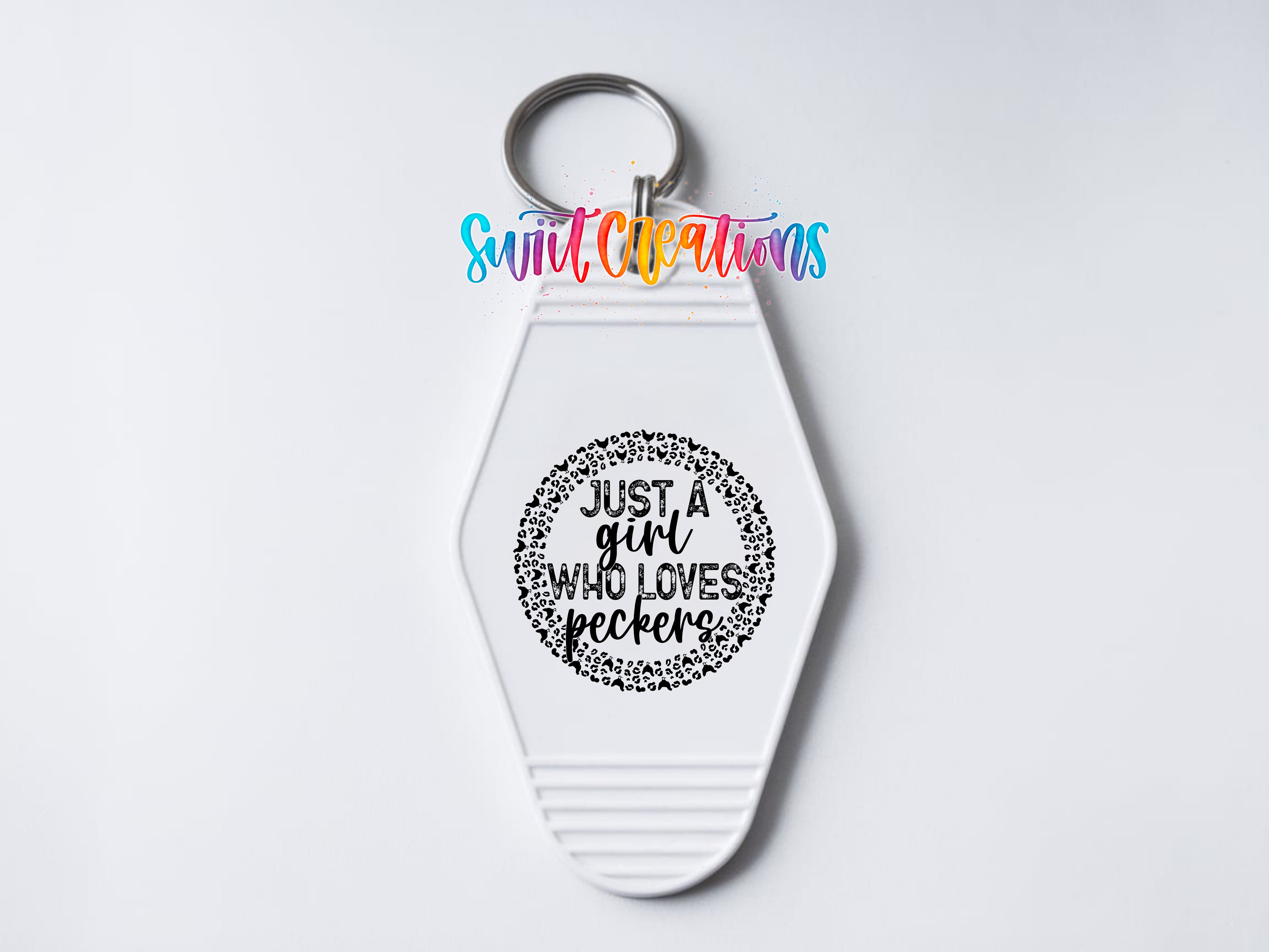 A keychain with a keyring and a message printed on it.
