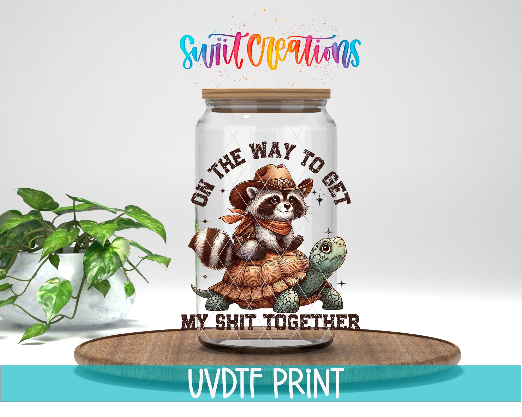 a jar with a raccoon wearing a cowboy hat and holding a turtle, along with the text "ON THE WAY TO GET MY SHIT TOGETHER" and "MY SHIT TOGETHER" printed on it.