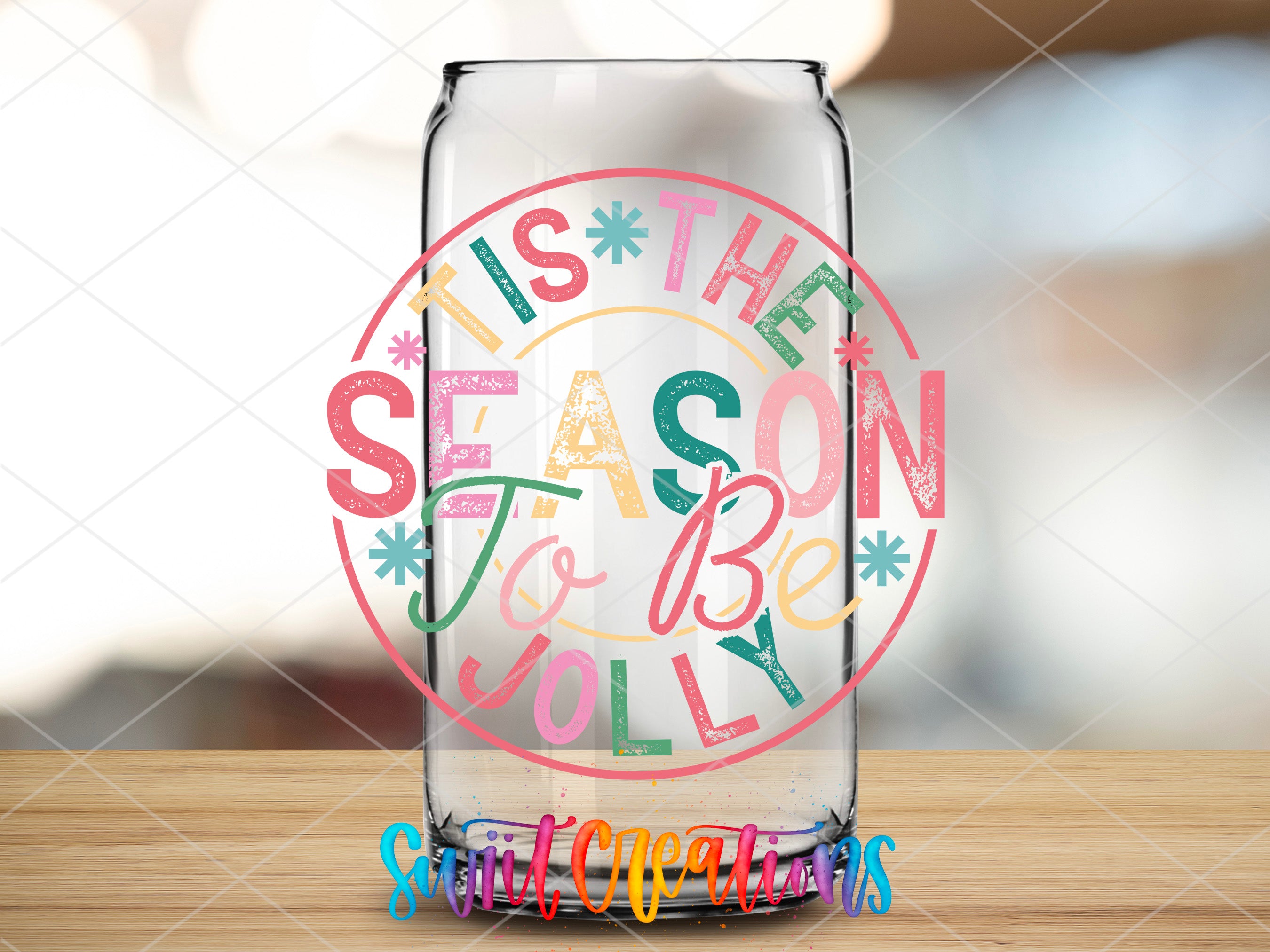 a glass with the words tis the season and holiday written on it