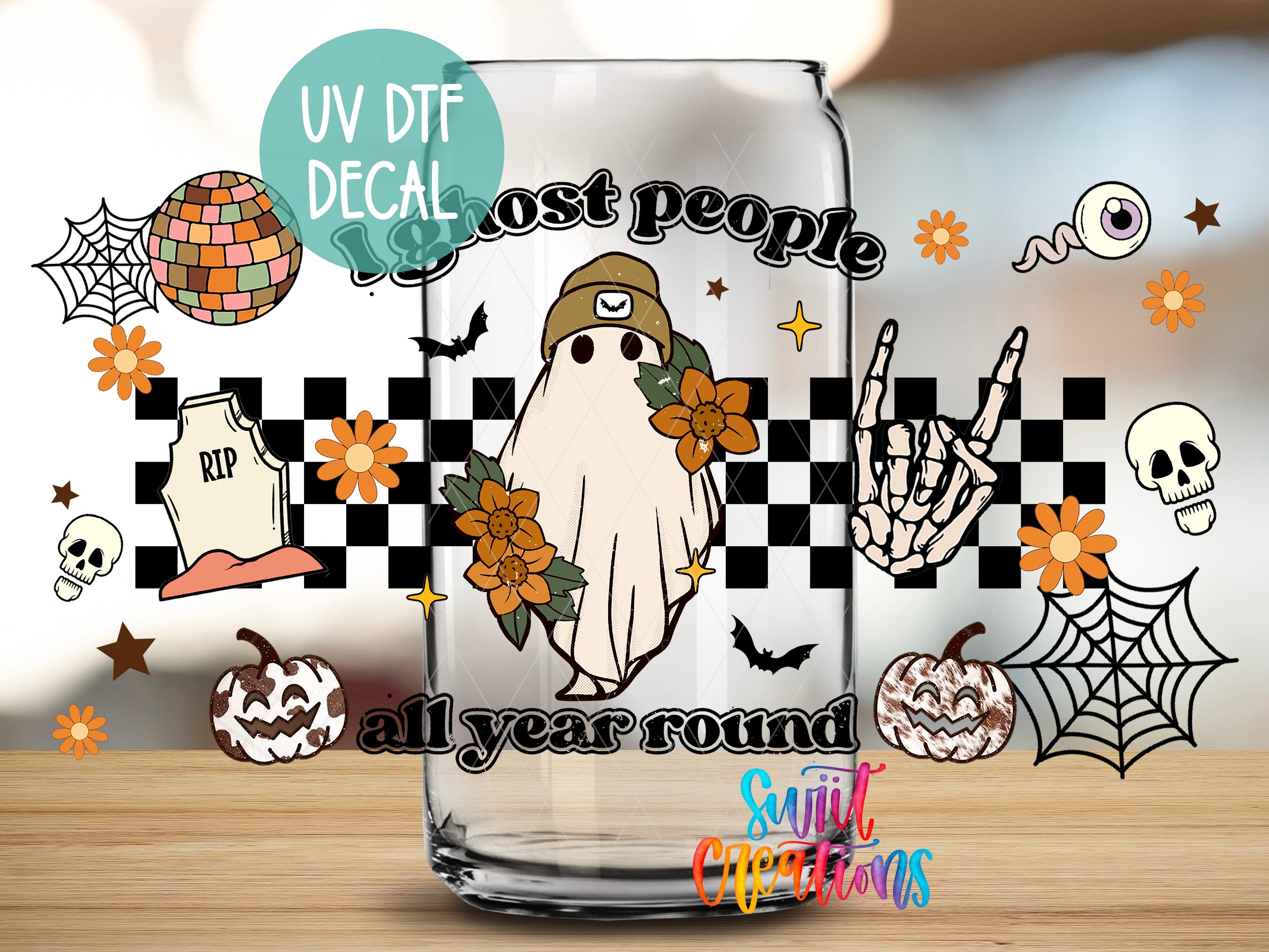 a glass with a picture of a ghost on it
