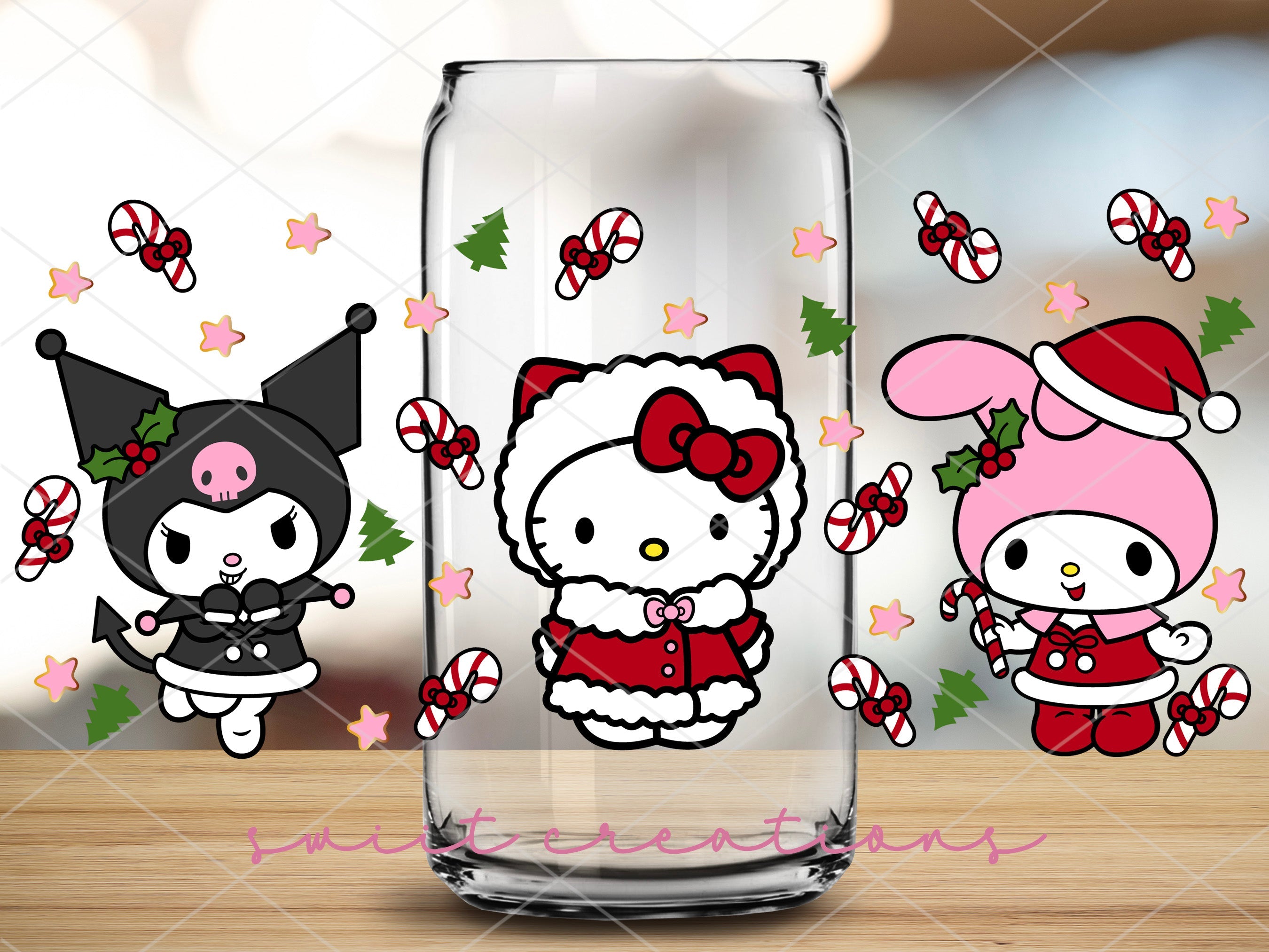 a glass with hello kitty and hello kitty on it