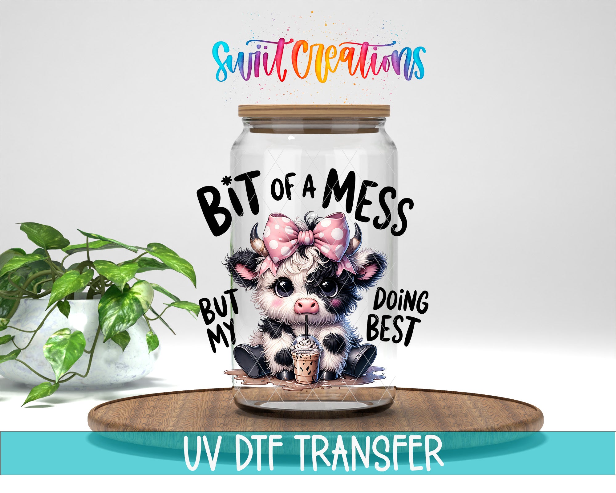 a glass jar with a cartoon cow inside, along with text that says "BIT OF A MESS BUT MY DOING BEST".