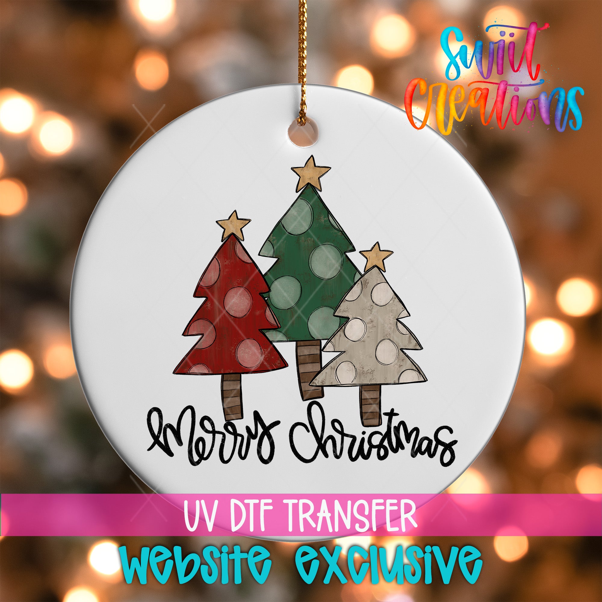 A white Christmas ornament with three colorful Christmas trees and the text "Merry Christmas" written on it.