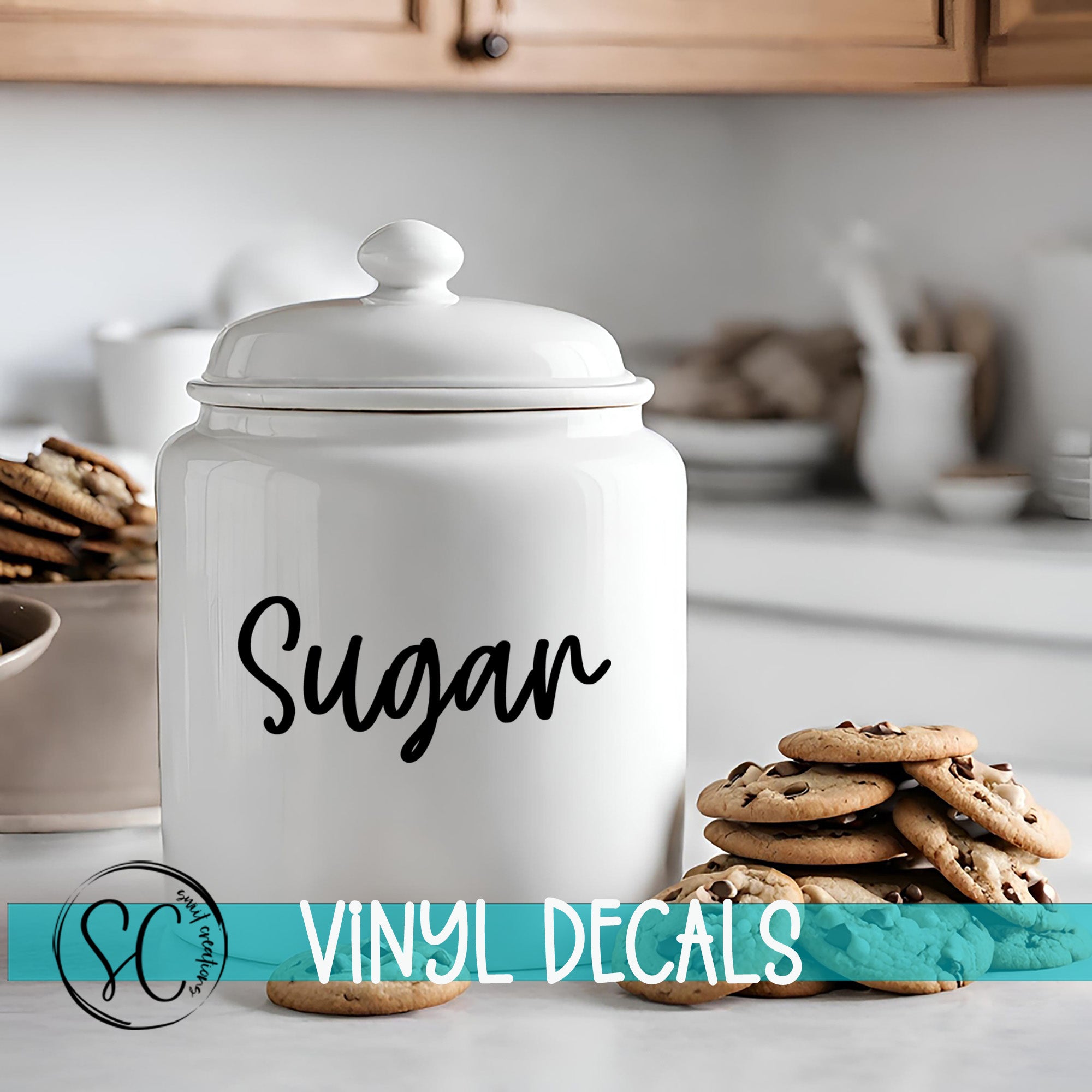 A white ceramic jar labeled "Sugar" sits on a kitchen counter, surrounded by stacks of chocolate chip cookies.