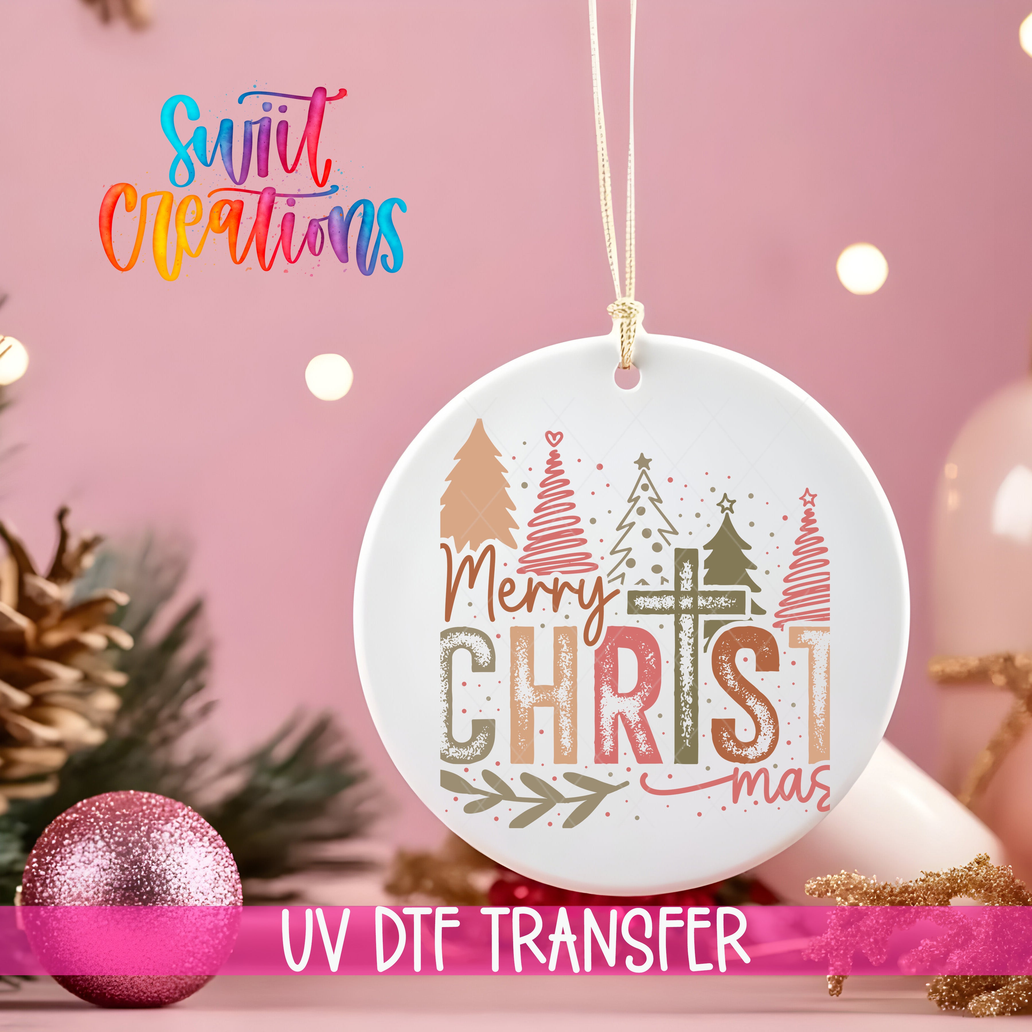 A white ceramic ornament with a festive design hangs against a pink background, surrounded by Christmas decorations and a pink glitter ornament.