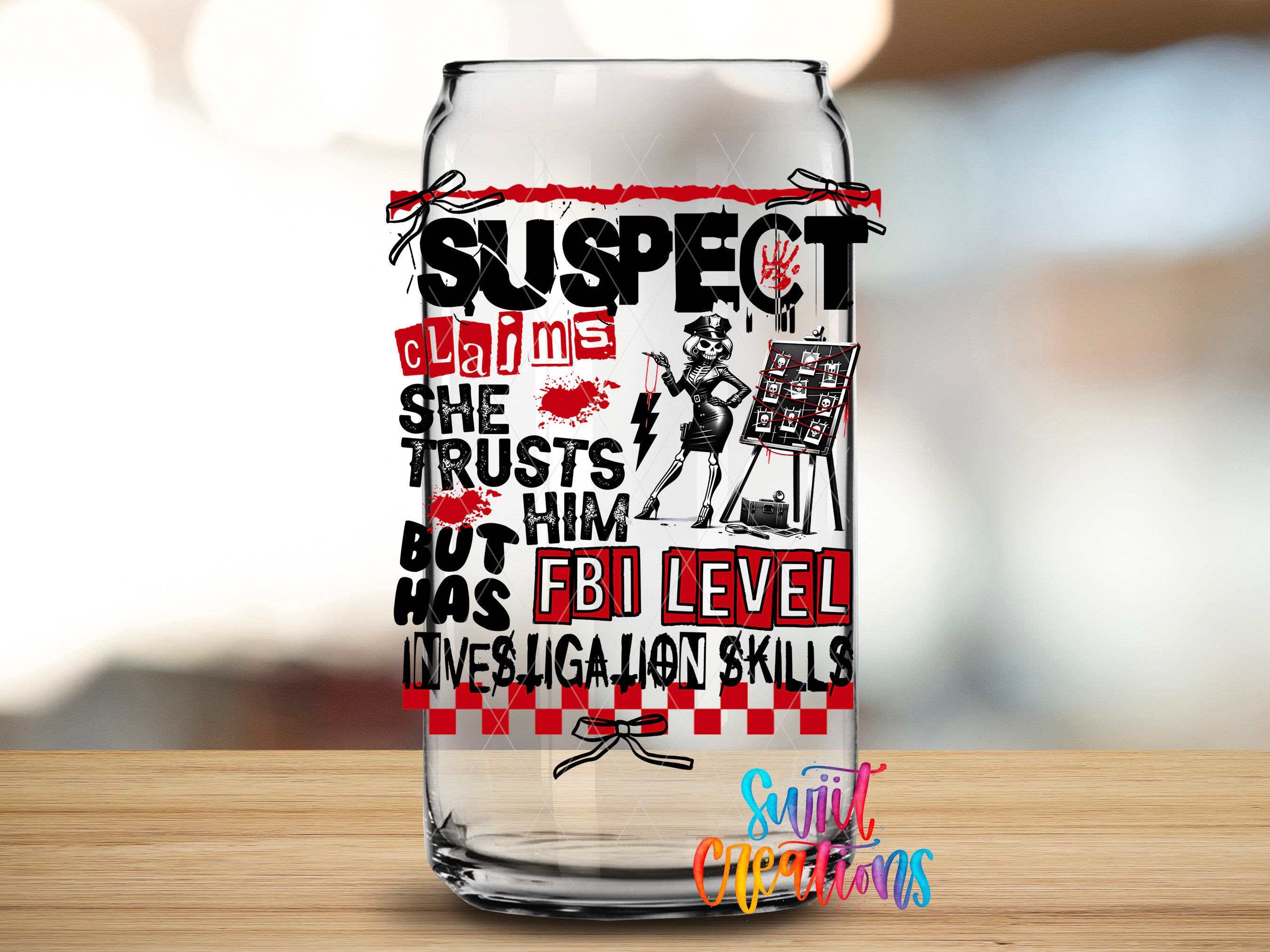 a glass can with a design that includes text and illustrations related to a fictional character named Suspect.
