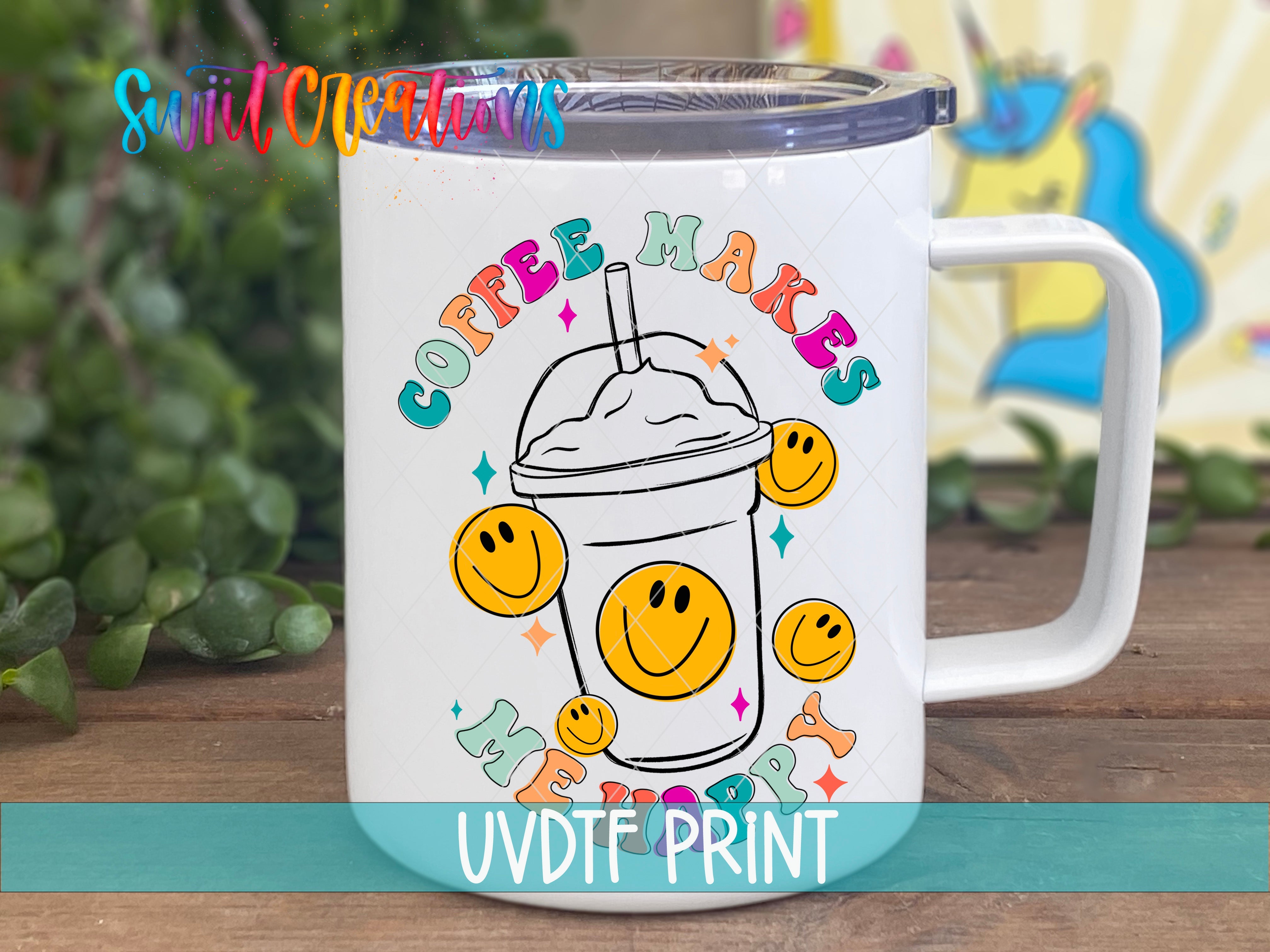 a white coffee mug with smiley faces on it