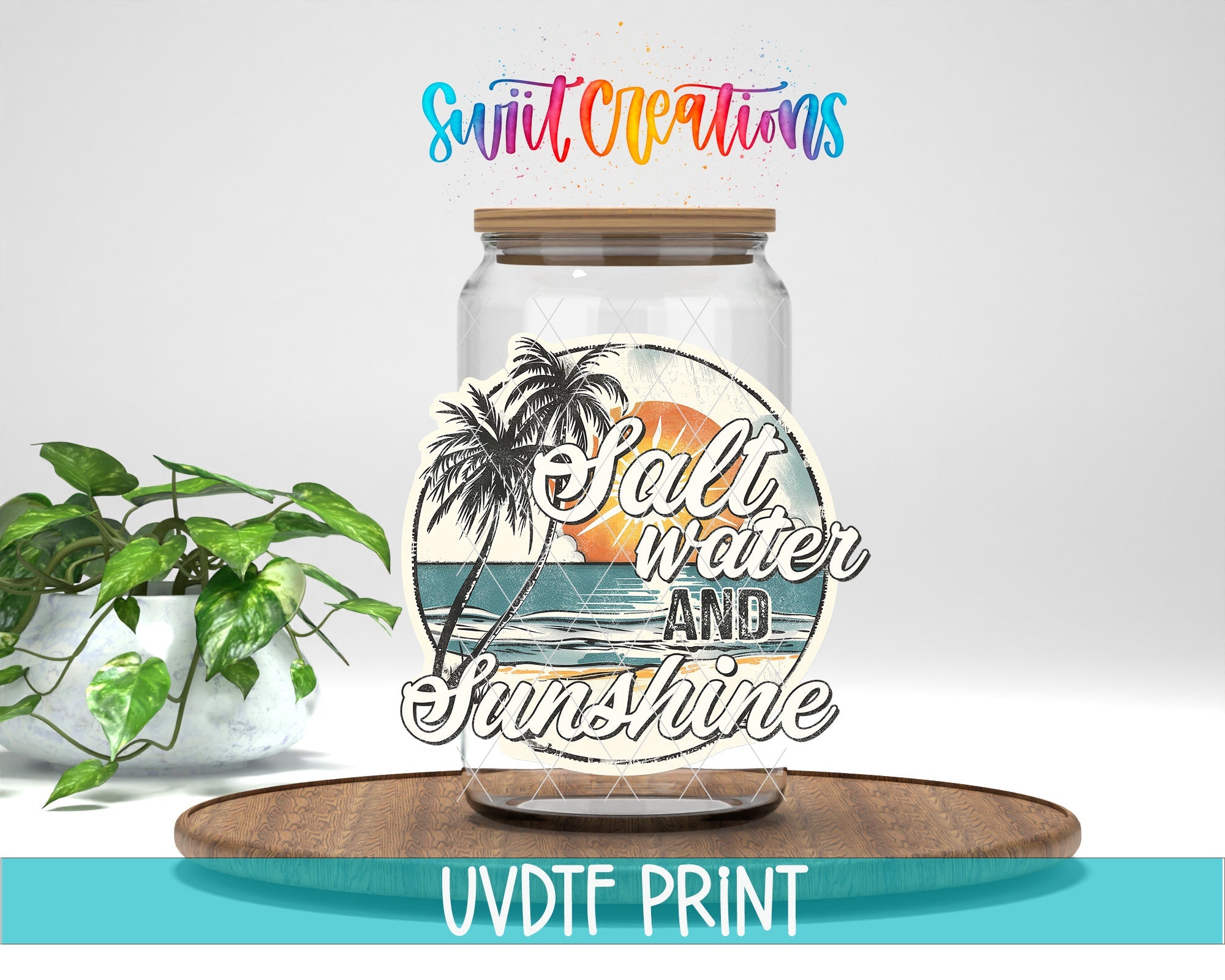 a glass jar with a beach scene inside of it