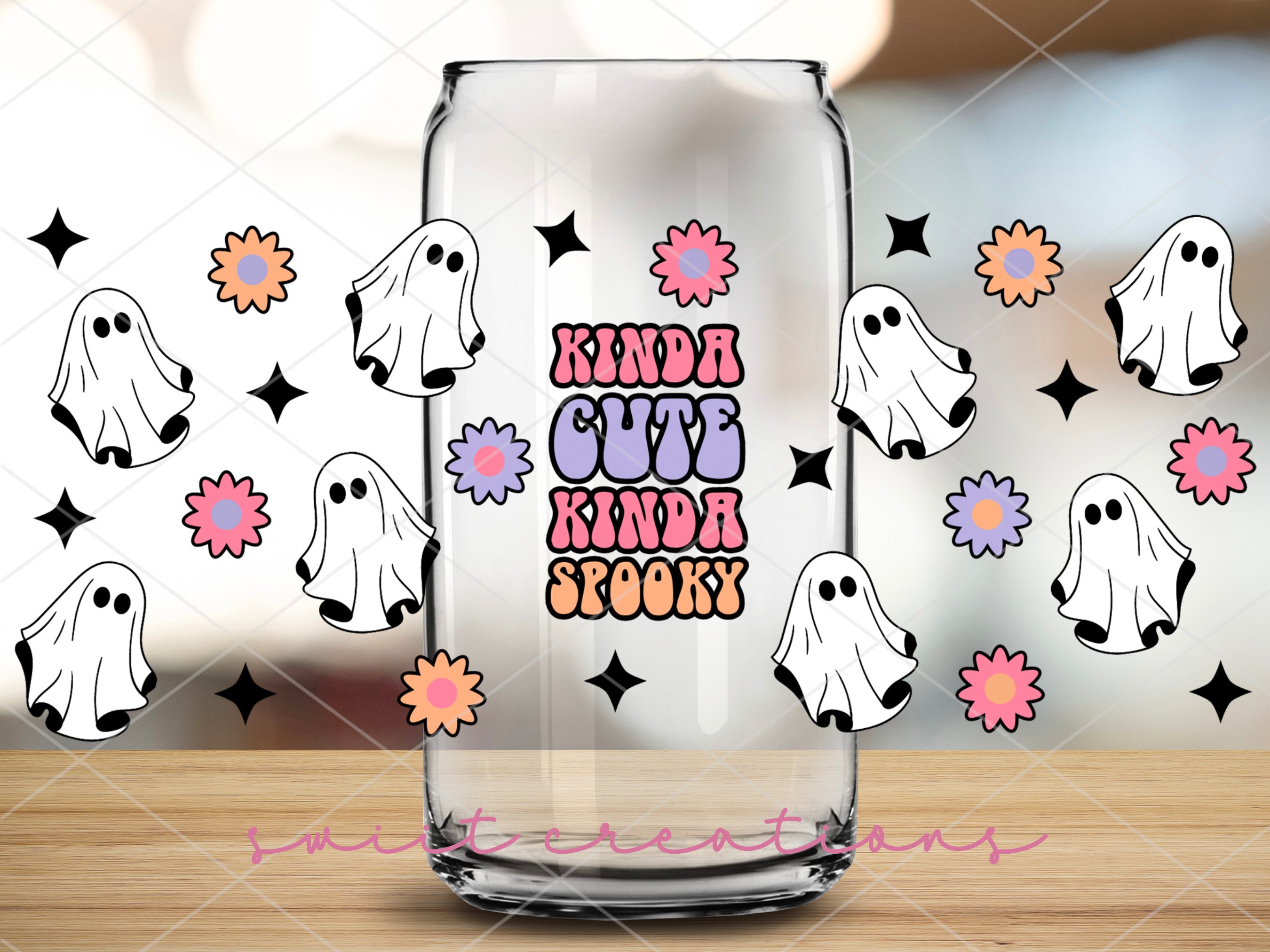 a glass with a picture of a ghost on it