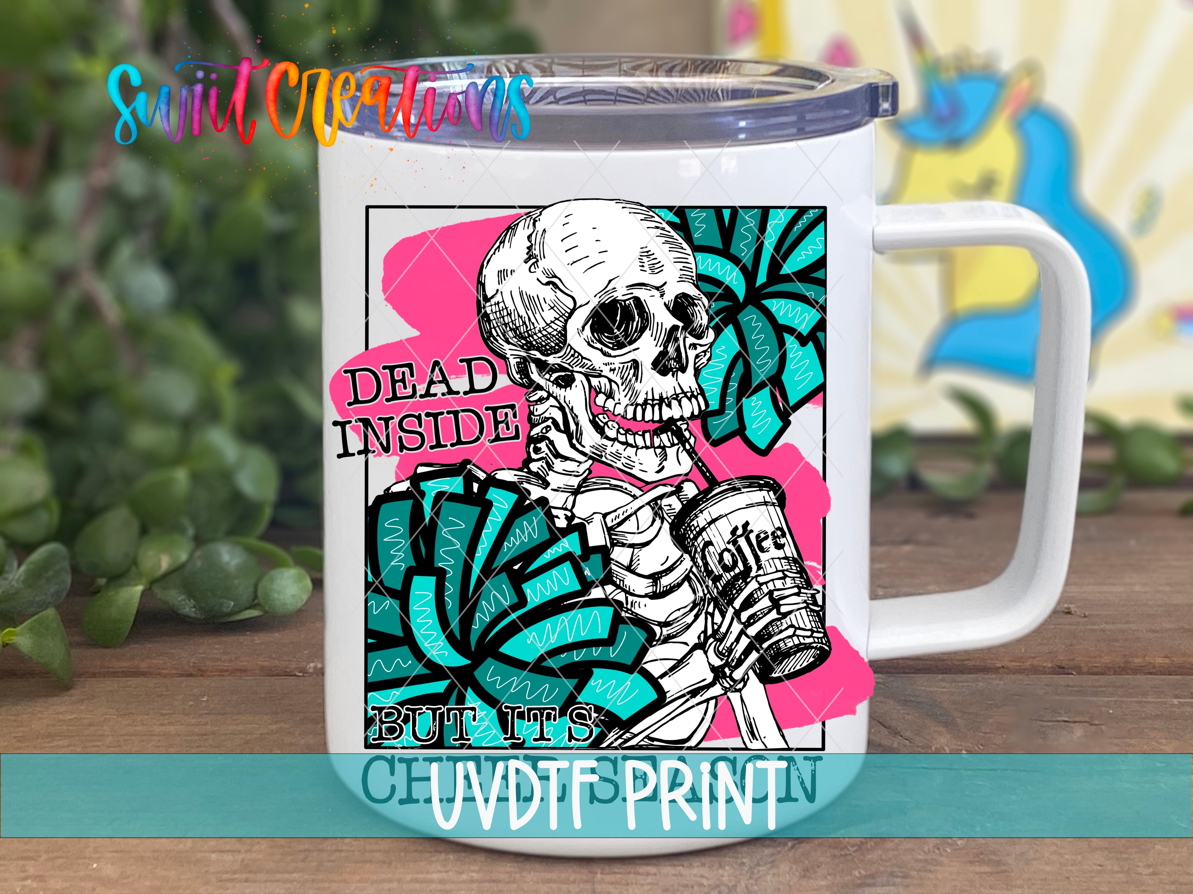 a white coffee mug with a skeleton on it