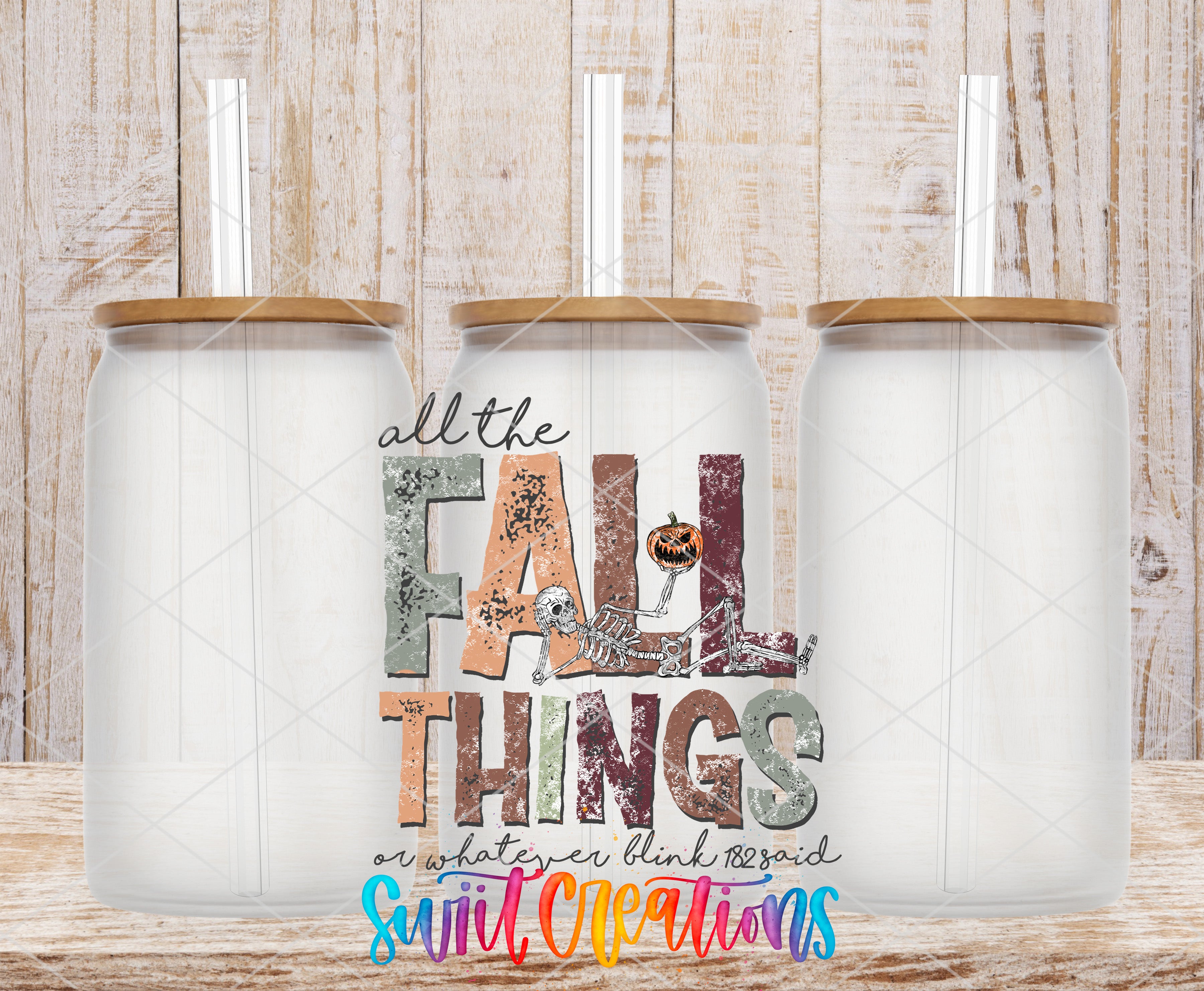 three white glass jars with lids, arranged in a row against a wooden background. The jars have a textured appearance, and the text "all the FALL THINGS or whatever you think" is displayed prominently in the center of the image.