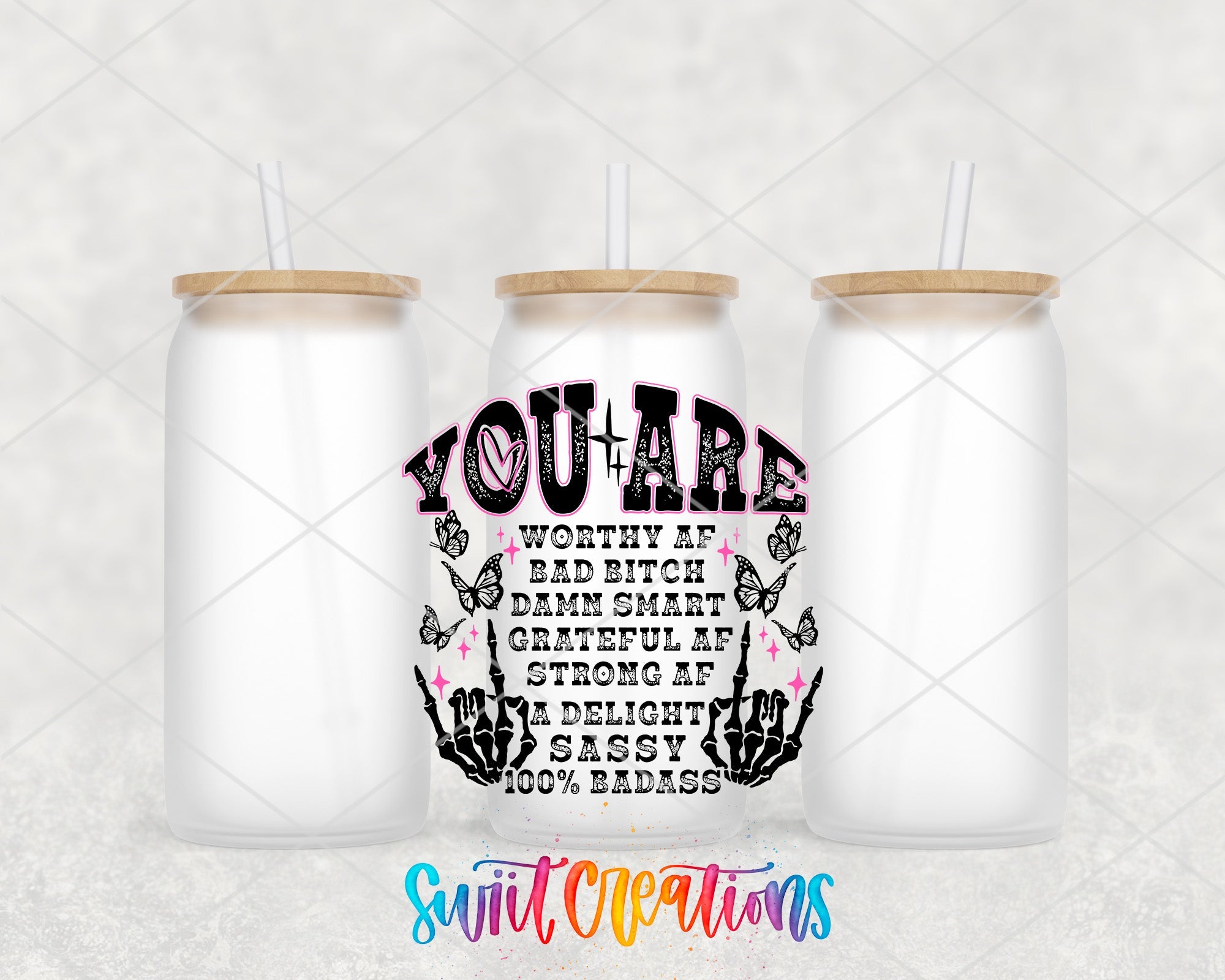 a couple of white mason jars sitting next to each other