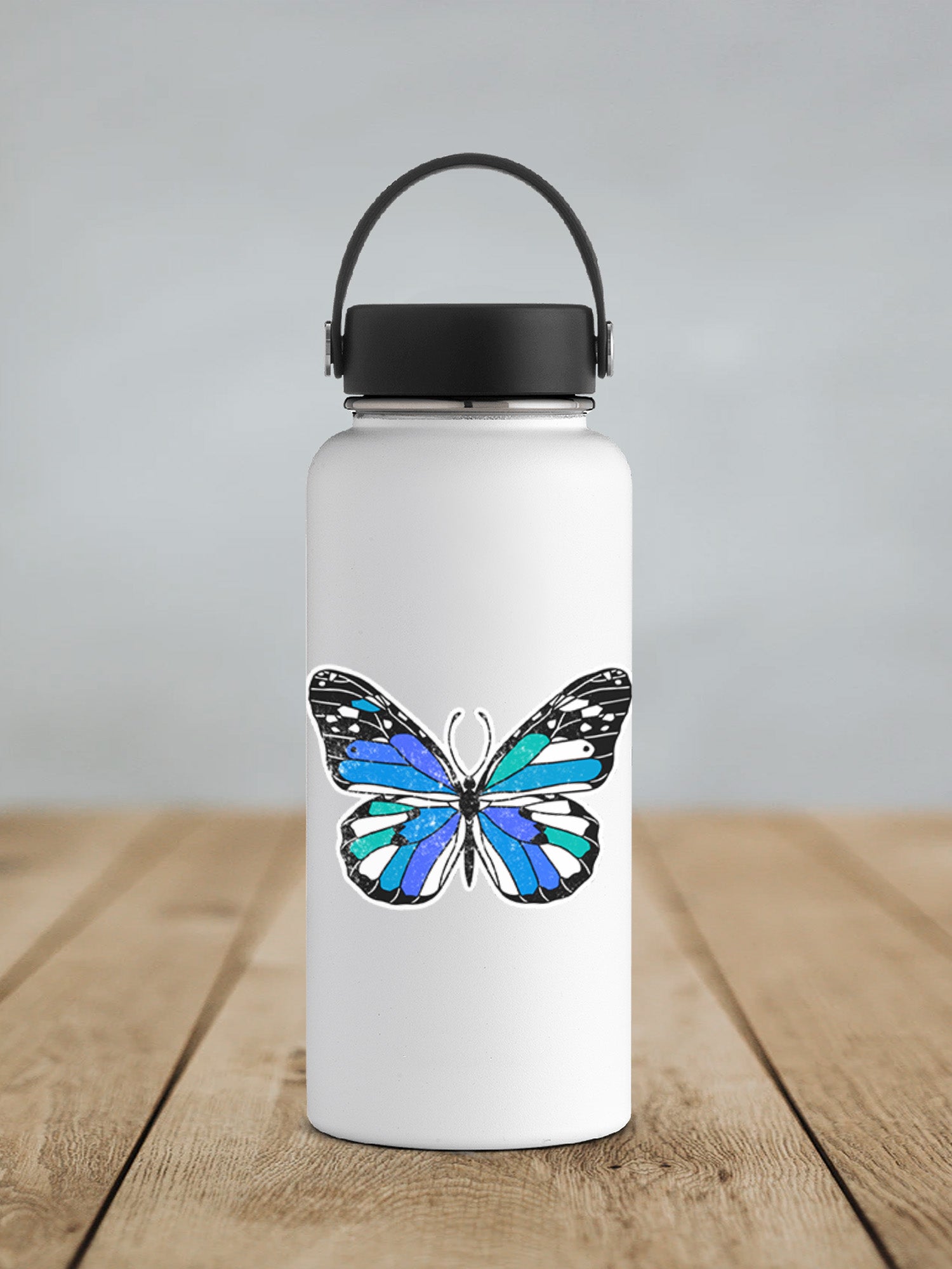 a white water bottle with a blue butterfly on it
