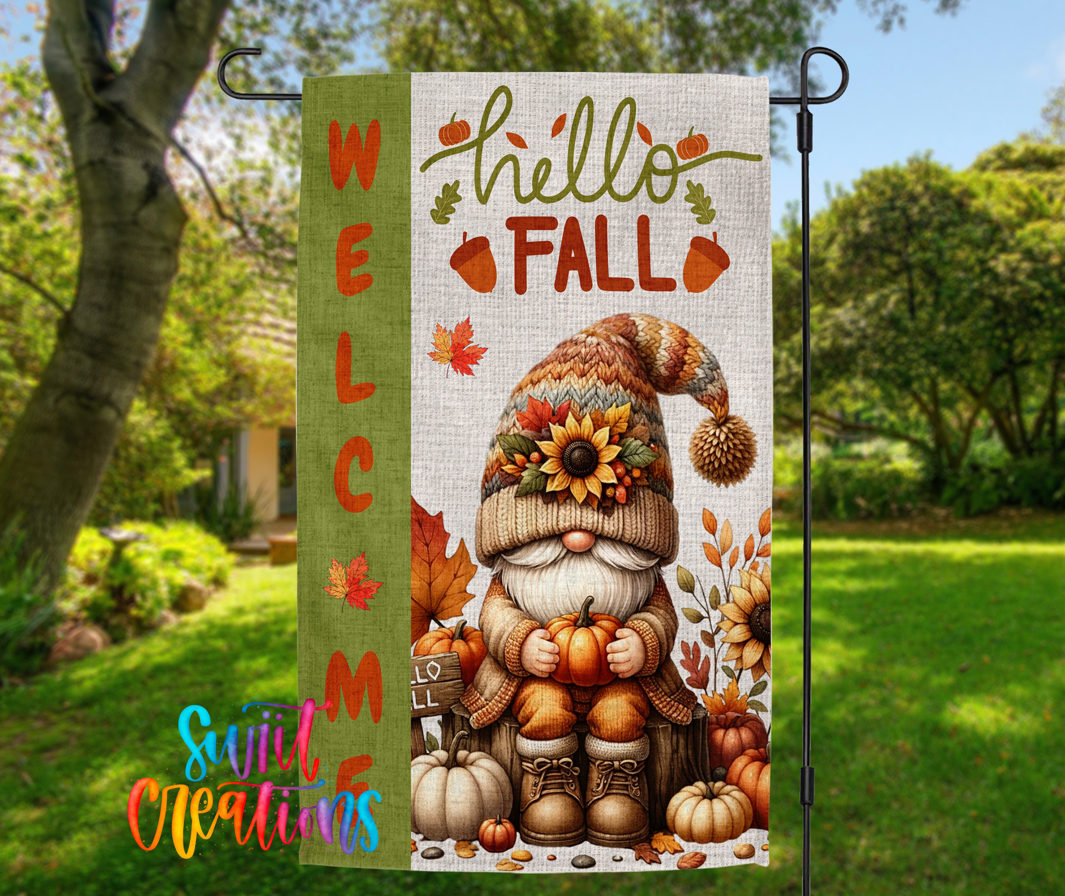 A colorful autumn-themed garden sign featuring a gnome holding pumpkins and surrounded by fall decorations.