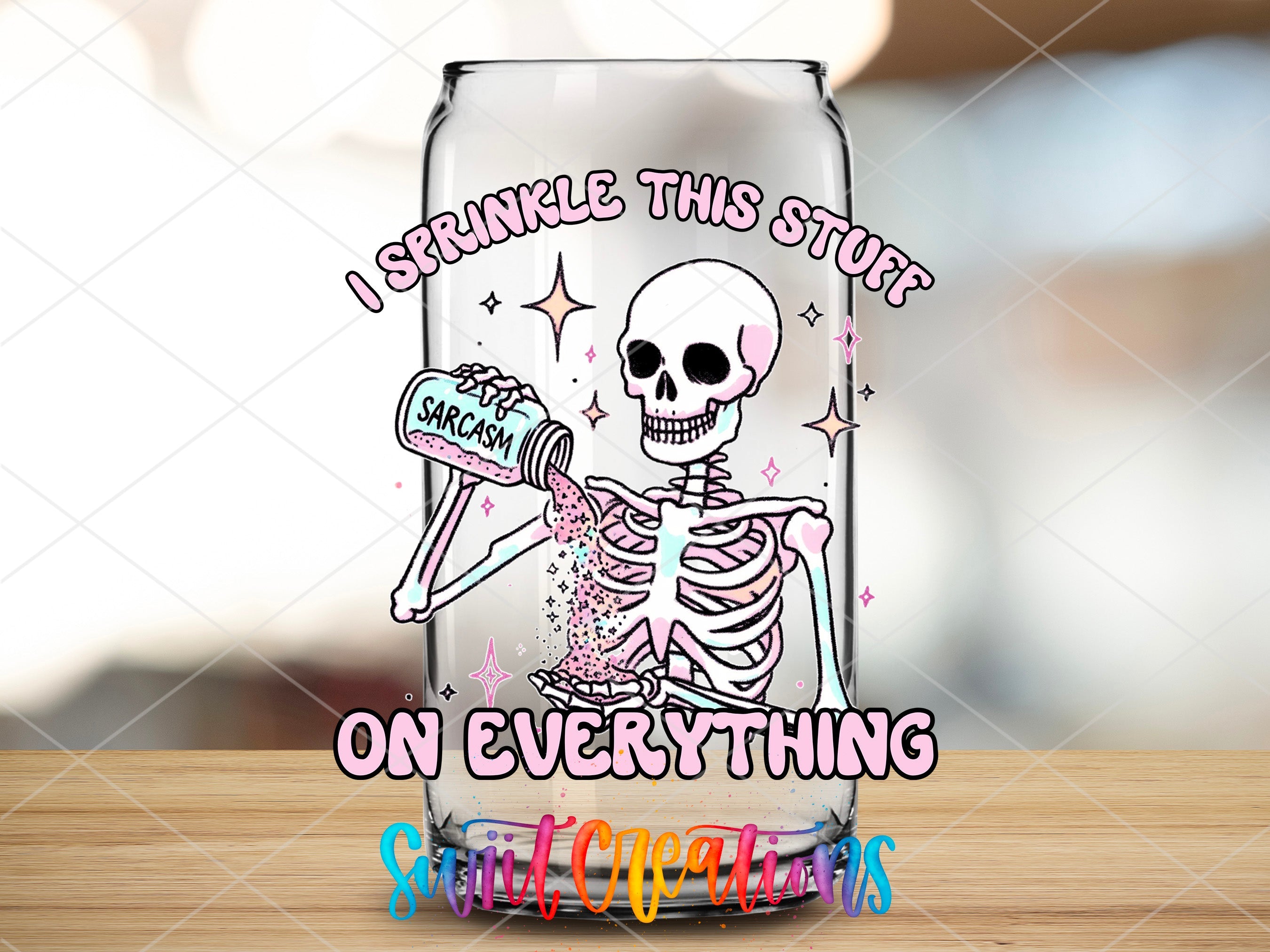 a glass jar with a skeleton in it
