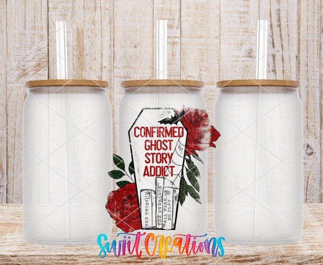 two white jars with red roses on them