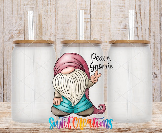 two coffee mugs with a gnome design on them