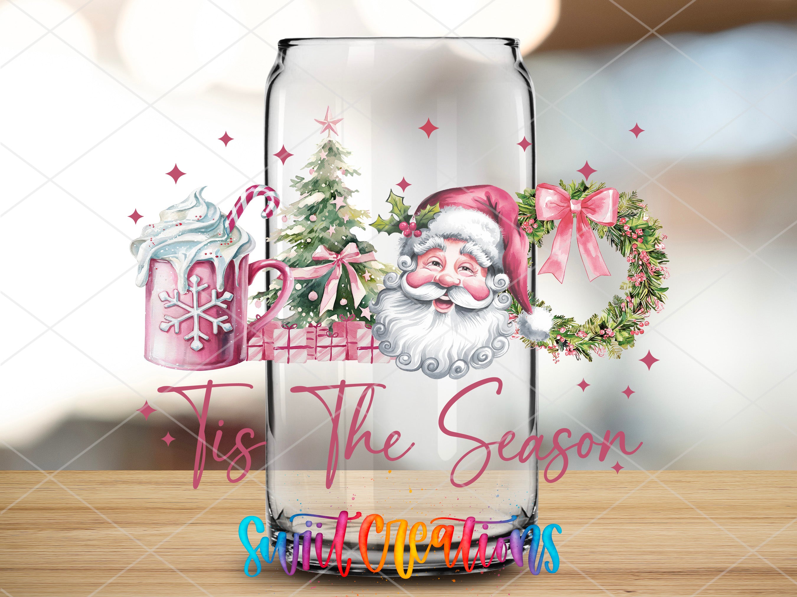 a glass jar with a santa clause on it