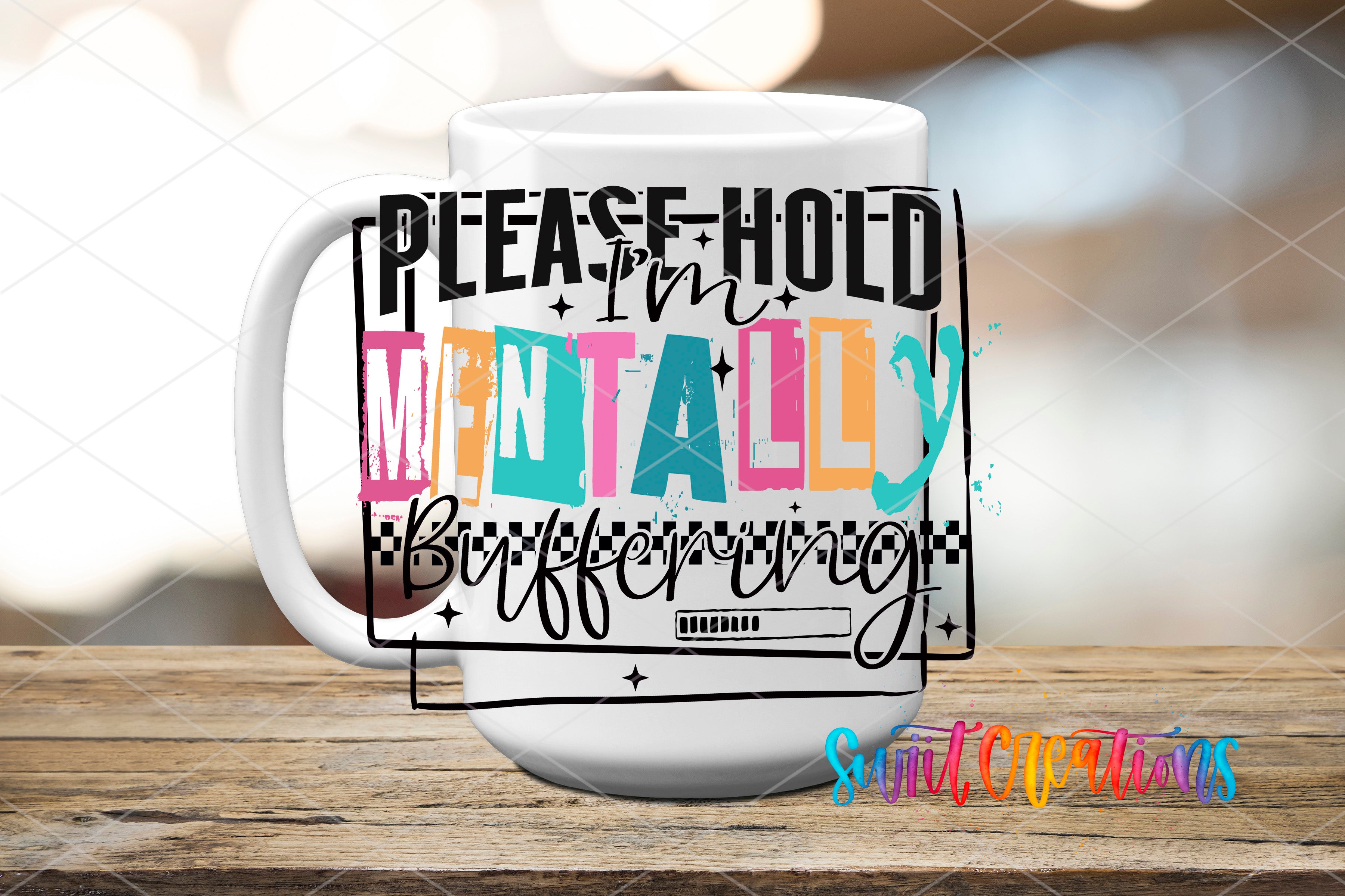 A white mug with colorful text that says "PLEASE HOLD MENTALLY BIFFERING" printed on it.