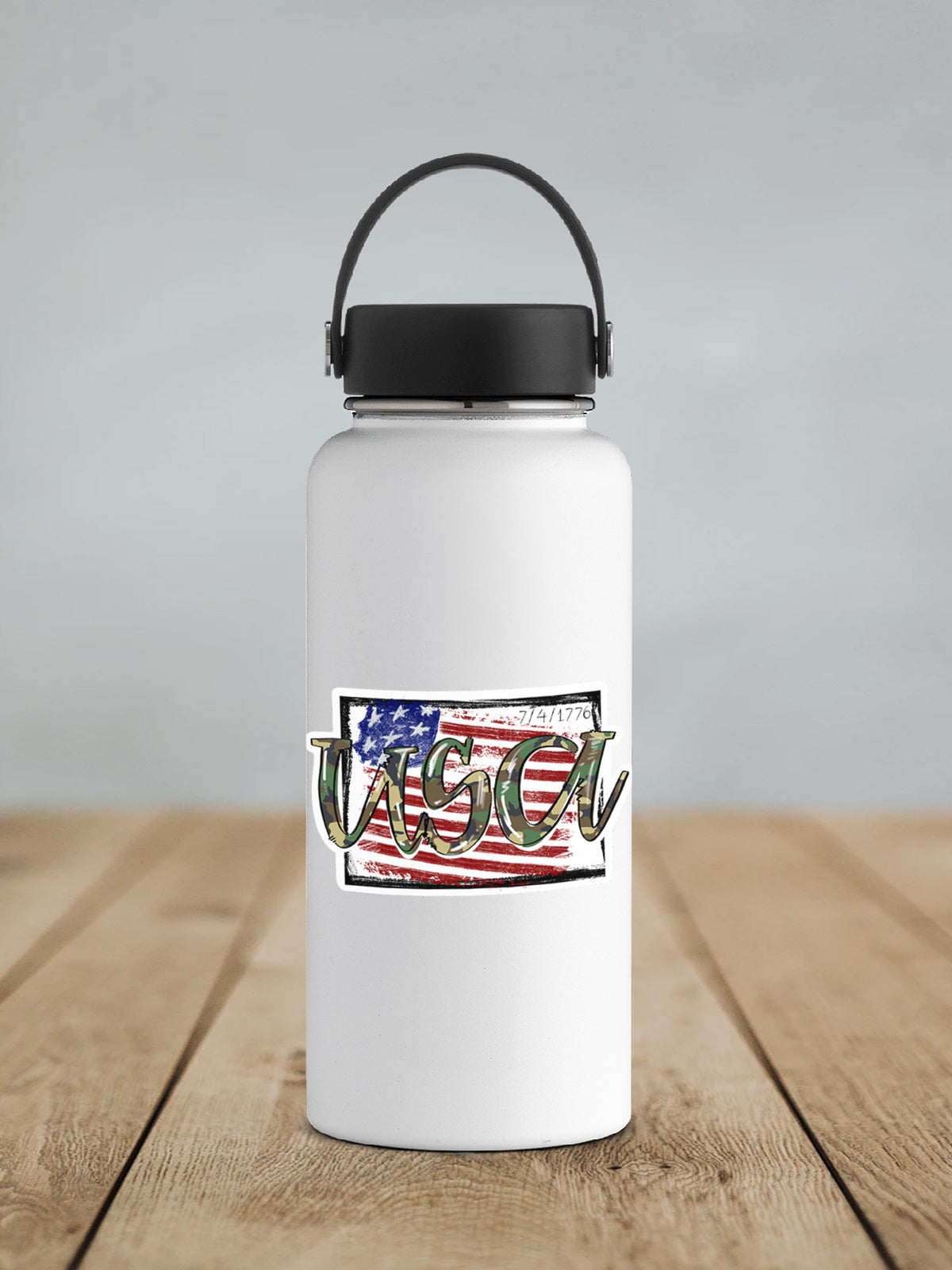 USA Camo sticker on a white insulated water bottle