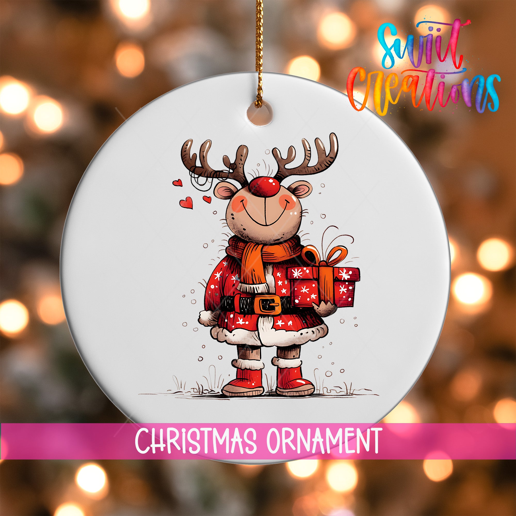 A white Christmas ornament featuring a cartoon reindeer holding a gift box and wearing a red scarf.