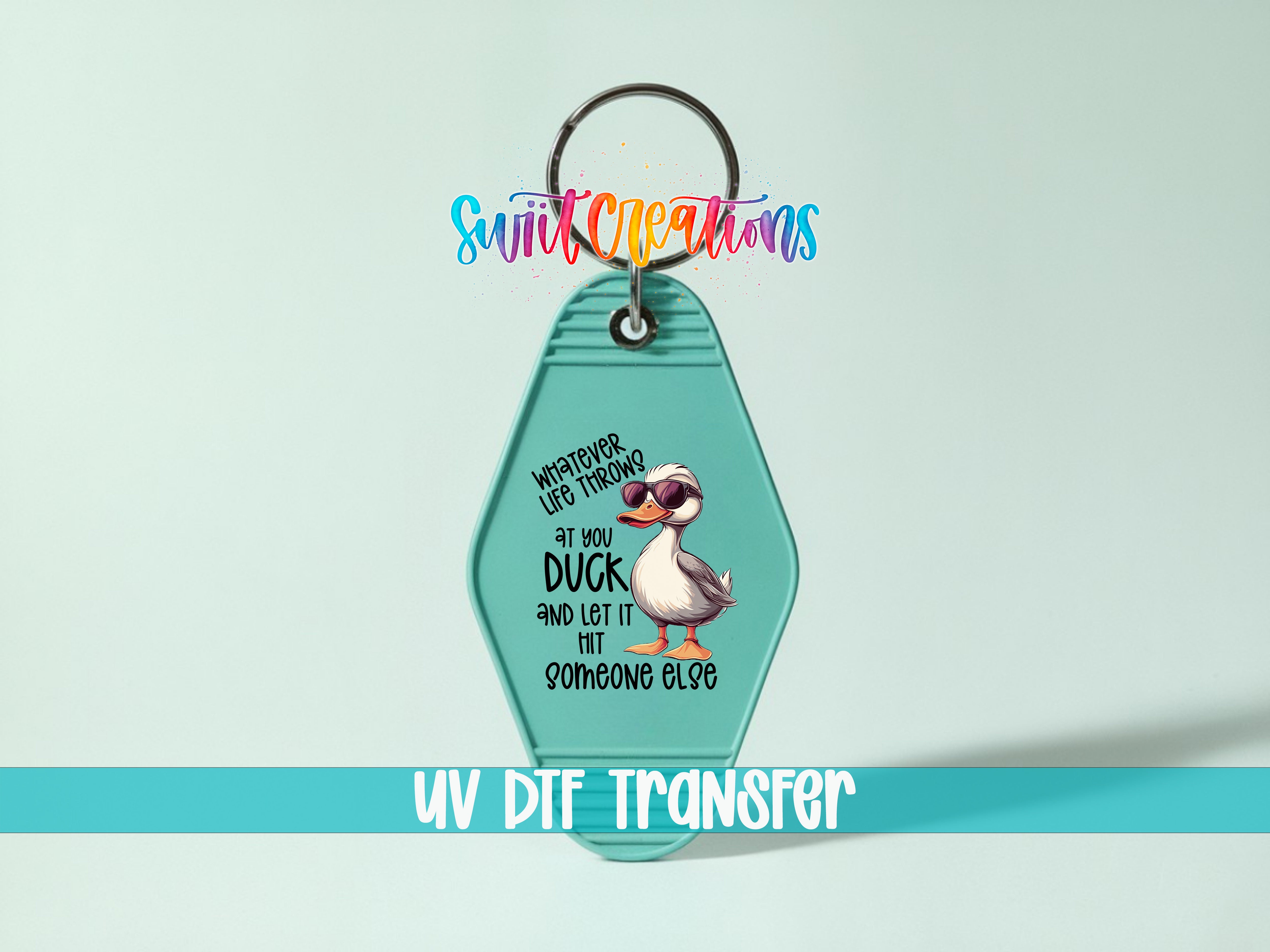 A keychain with a cartoon duck and text that says "Whatever you throw at me, let it hit someone else".